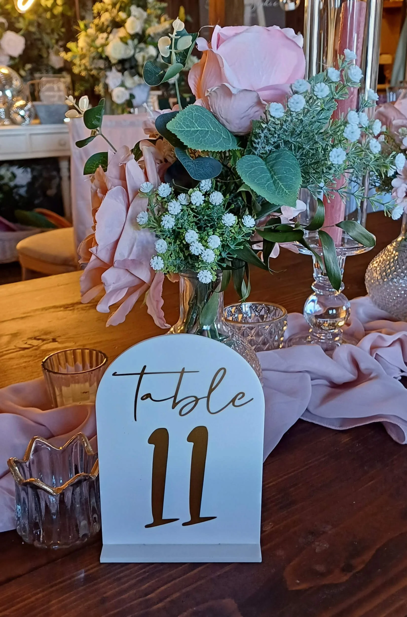 Arched Perspex table number - White with gold writing.  Numbers 1-15