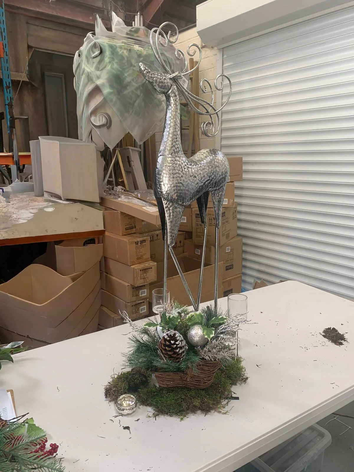 Festive Deer Antique Silver 100cmH x 30cmW x 17D metallic silver decorative deer available to hire for your wedding or event.