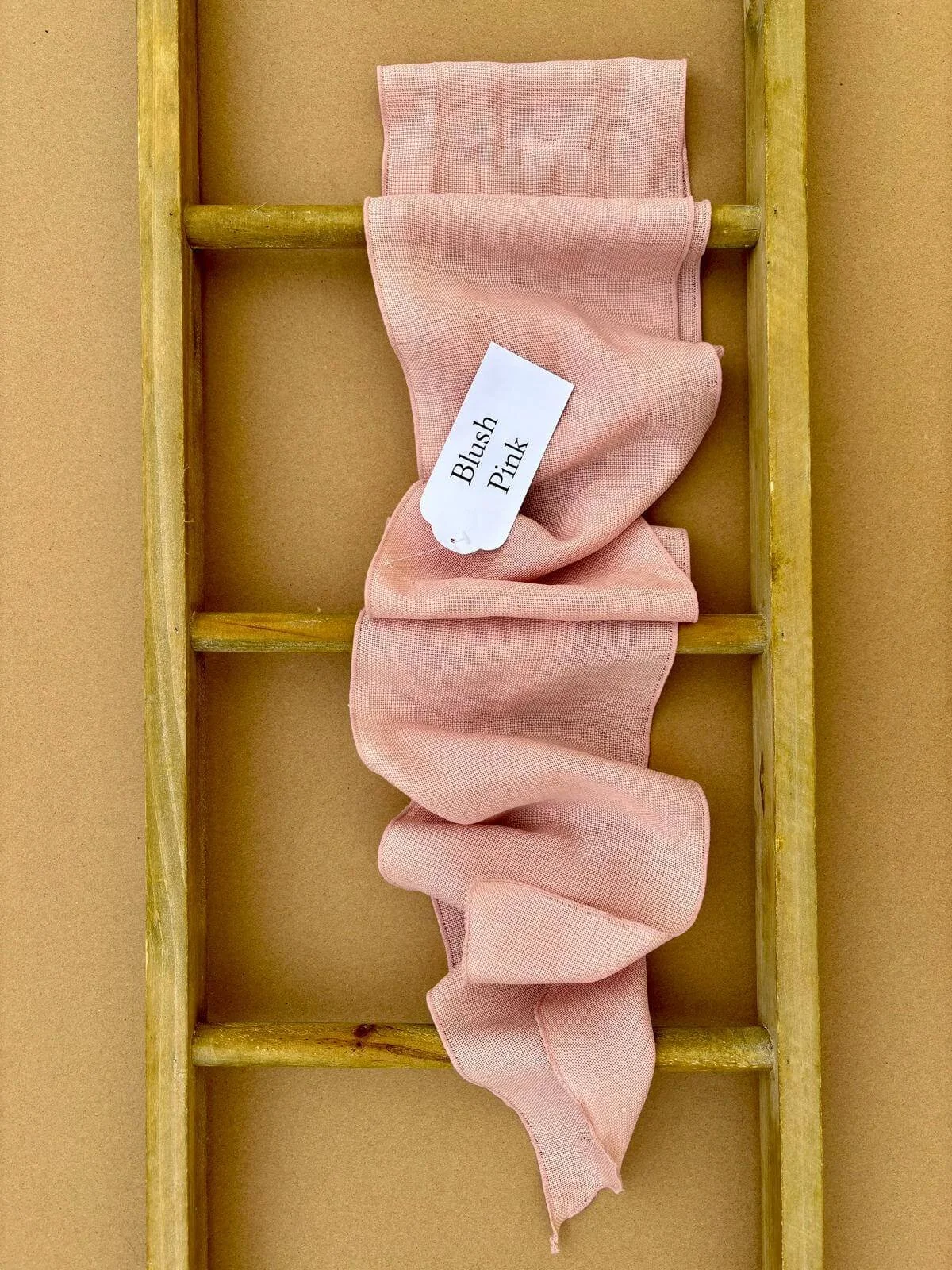 Hire linen chair sashes for weddings and events, available in a selection of colours and professionally fitted in various styles. Co-ordinating linen table runners also available.