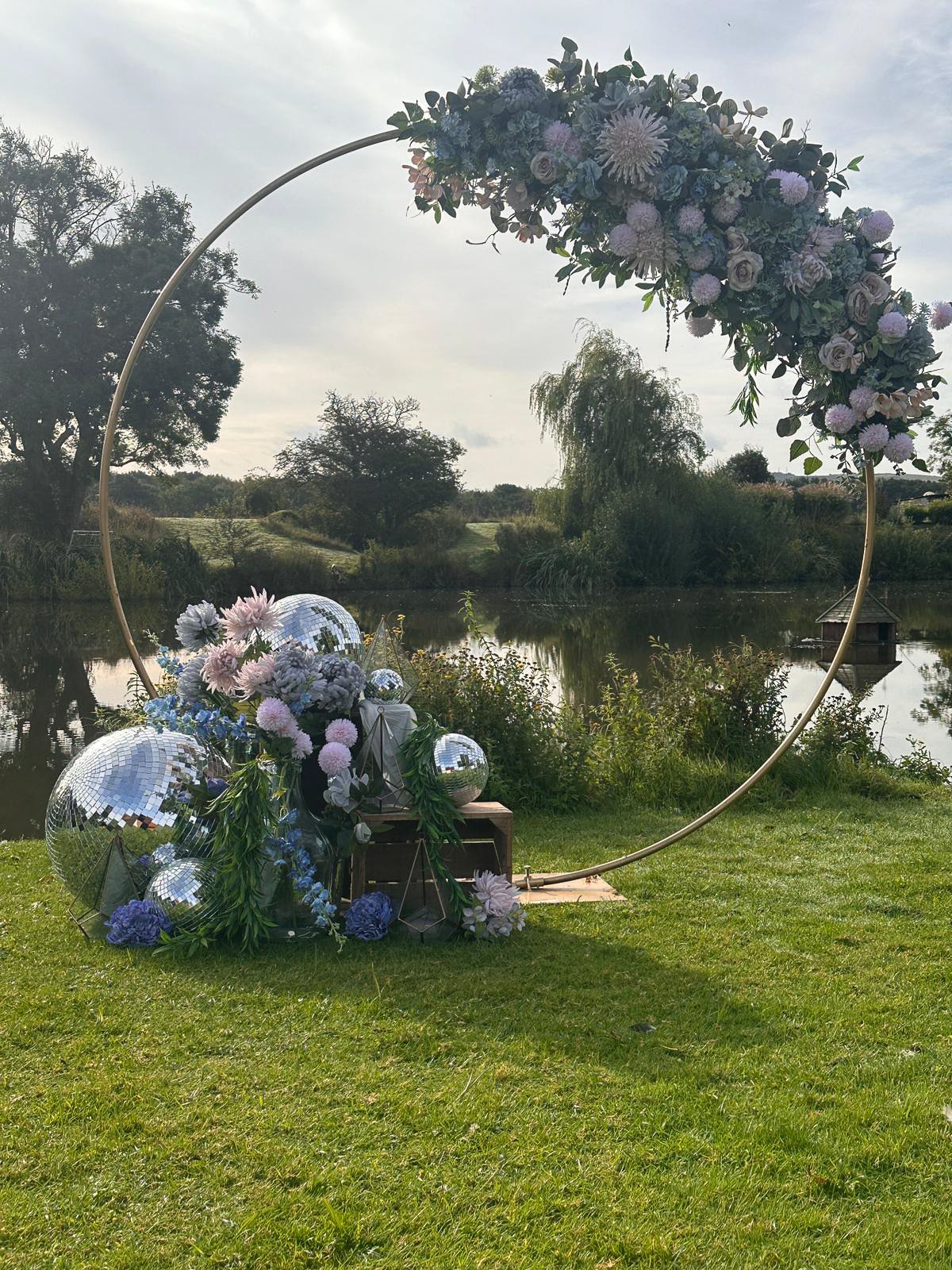 Hire our 2 metre moongate arch in black or gold for weddings and events. Style with bespoke faux florals, coloured draping or your own florist for a stunning backdrop.