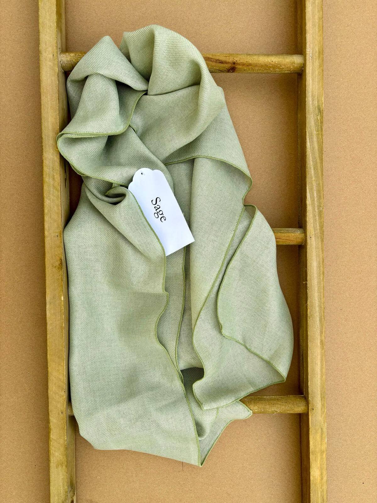 Hire linen chair sashes for weddings and events, available in a selection of colours and professionally fitted in various styles. Co-ordinating linen table runners also available.