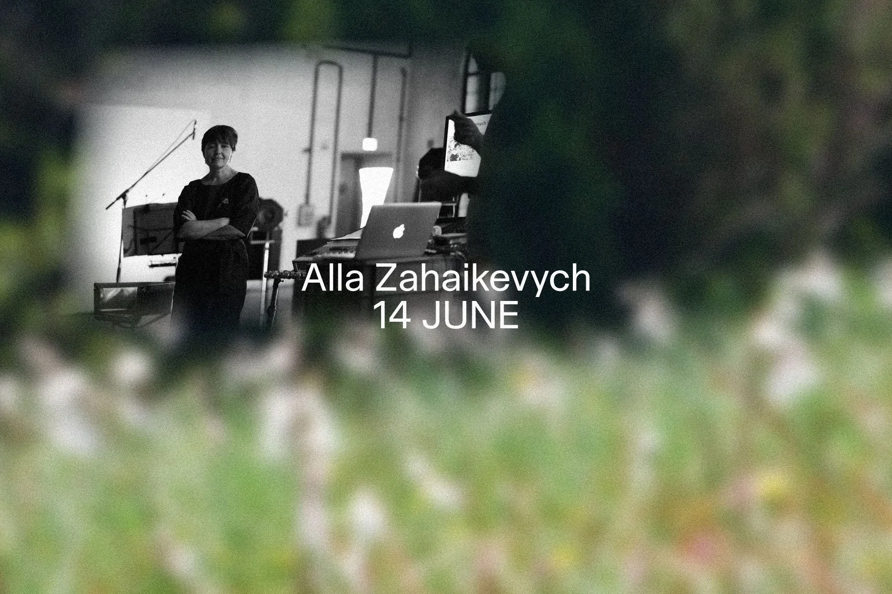 A black and white photo of a woman standing in a room with musical equipment, with the text 'Alla Zahaikevych 14 JUNE' overlaid.