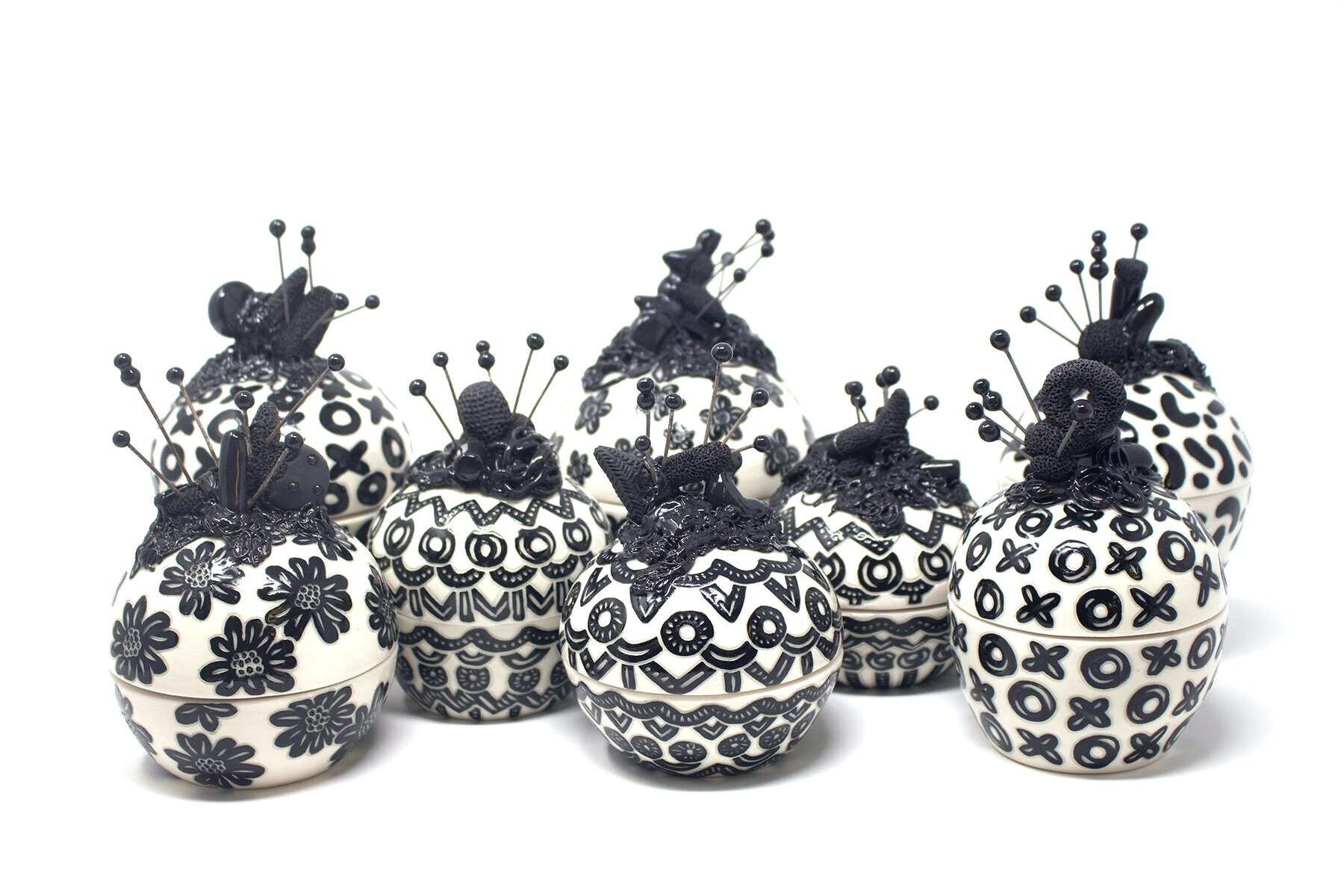 Grouping of Black and White Jars