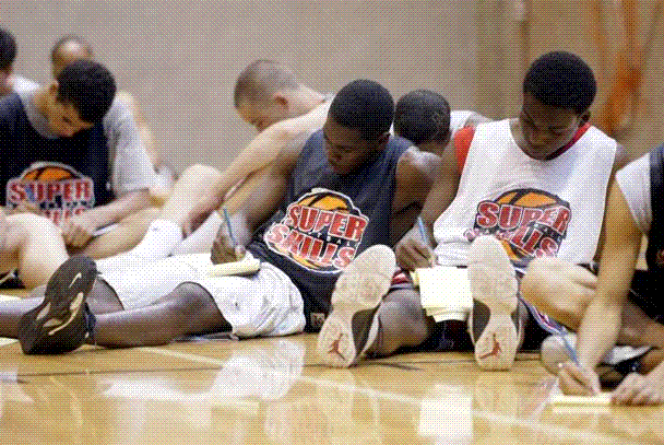 Boys Taking Notes.GIF