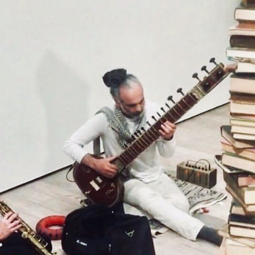 Evan Haros!

@evanharos played sitar for us on screen in one of the early scenes of In Her Name. His band @liberate_elemental_forces, an Indian classic and experimental raga collective, creates more than music. They elevate the feild their music infu