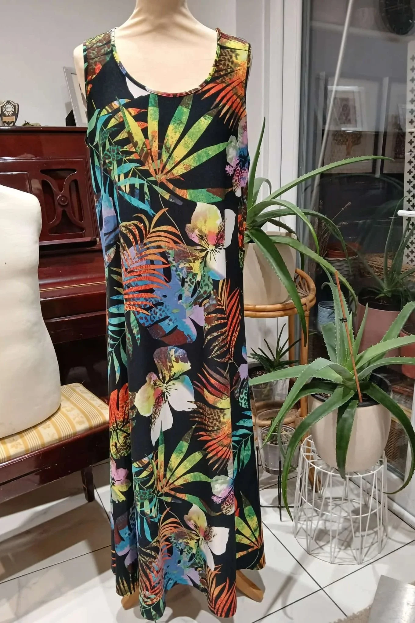 Free flowing A line multi patterned dress.  Very easy to wash and go.