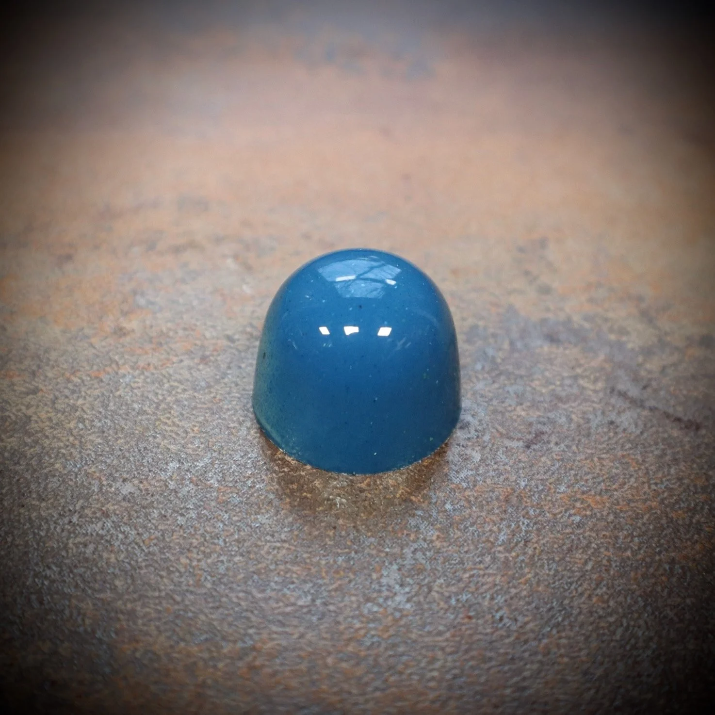 Photo of a red and gold passion fruit bonbon