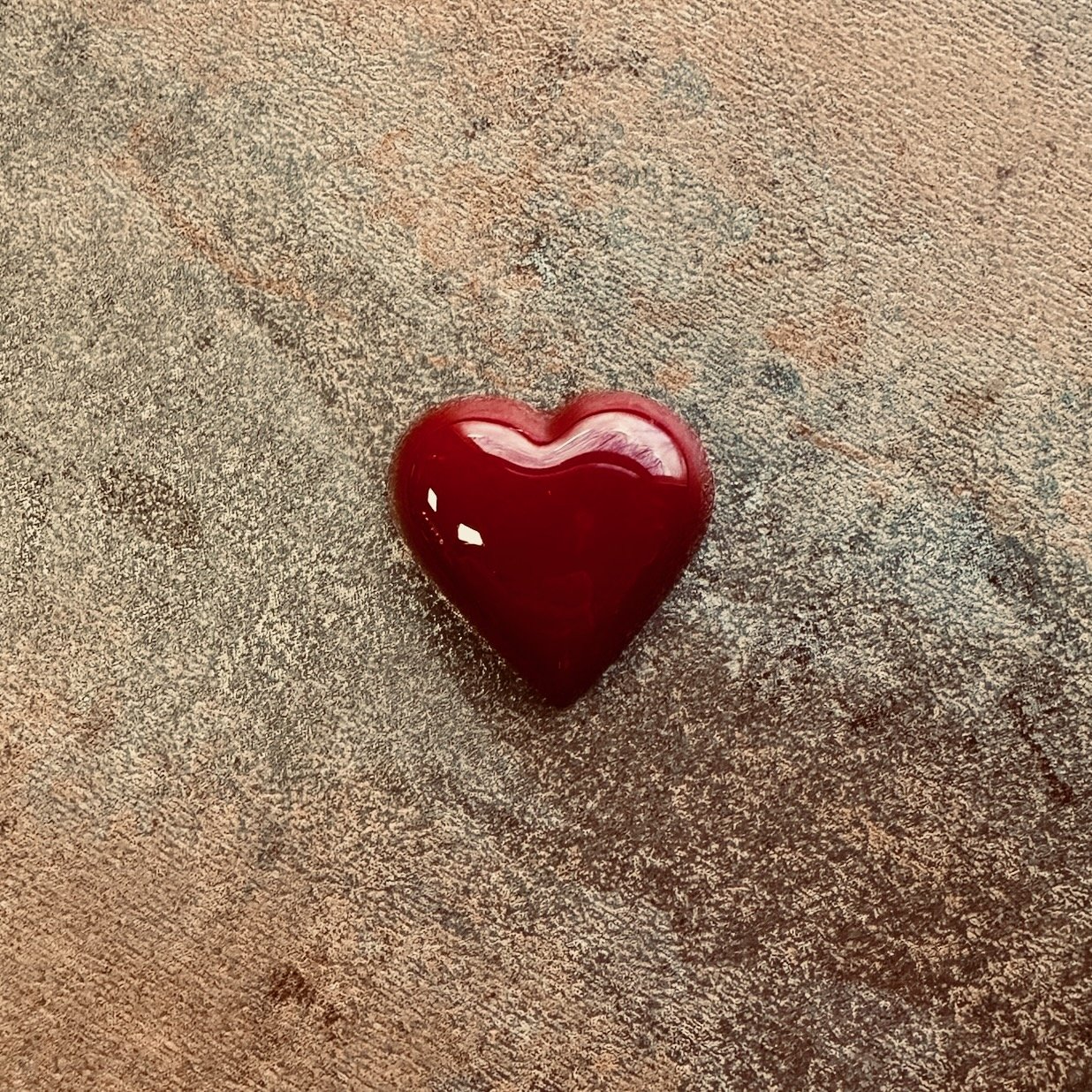 Dark red heart shaped bonbon