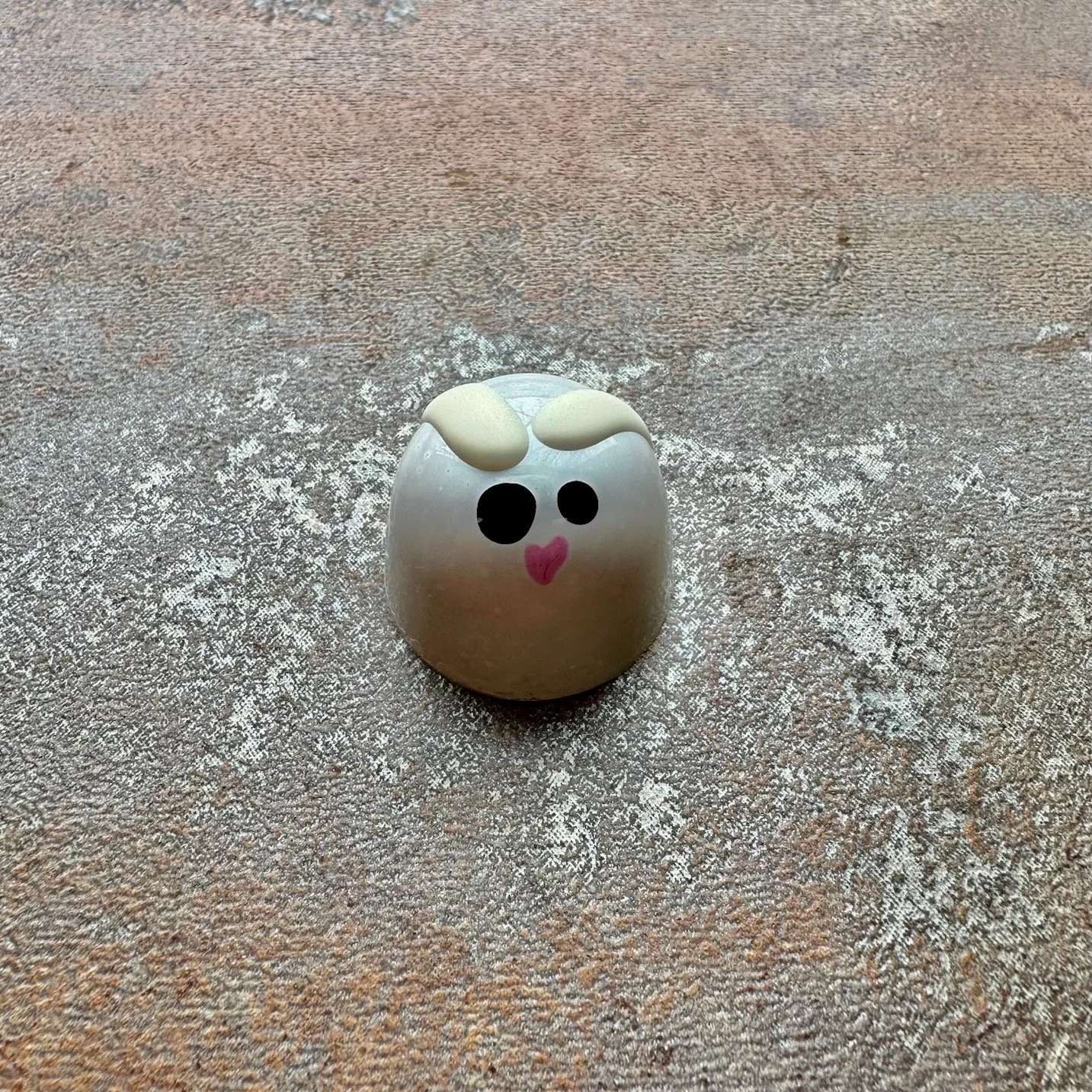 White colored bonbons with bunny ears and eyes