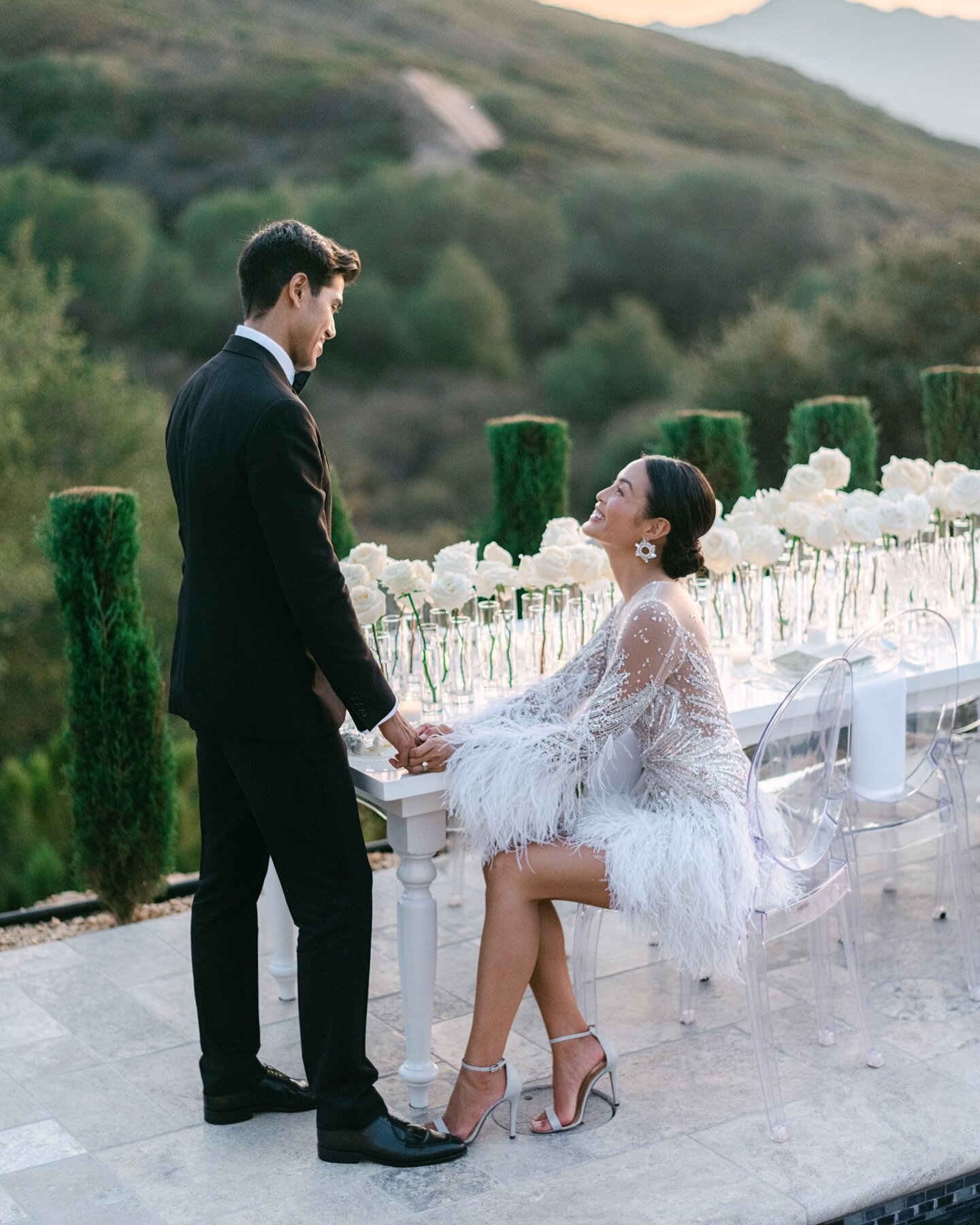 When the photographer gets that perfect picture in right before guests are ushered in to take their seats for the wedding reception. And how amazing is this reception dress? 😍