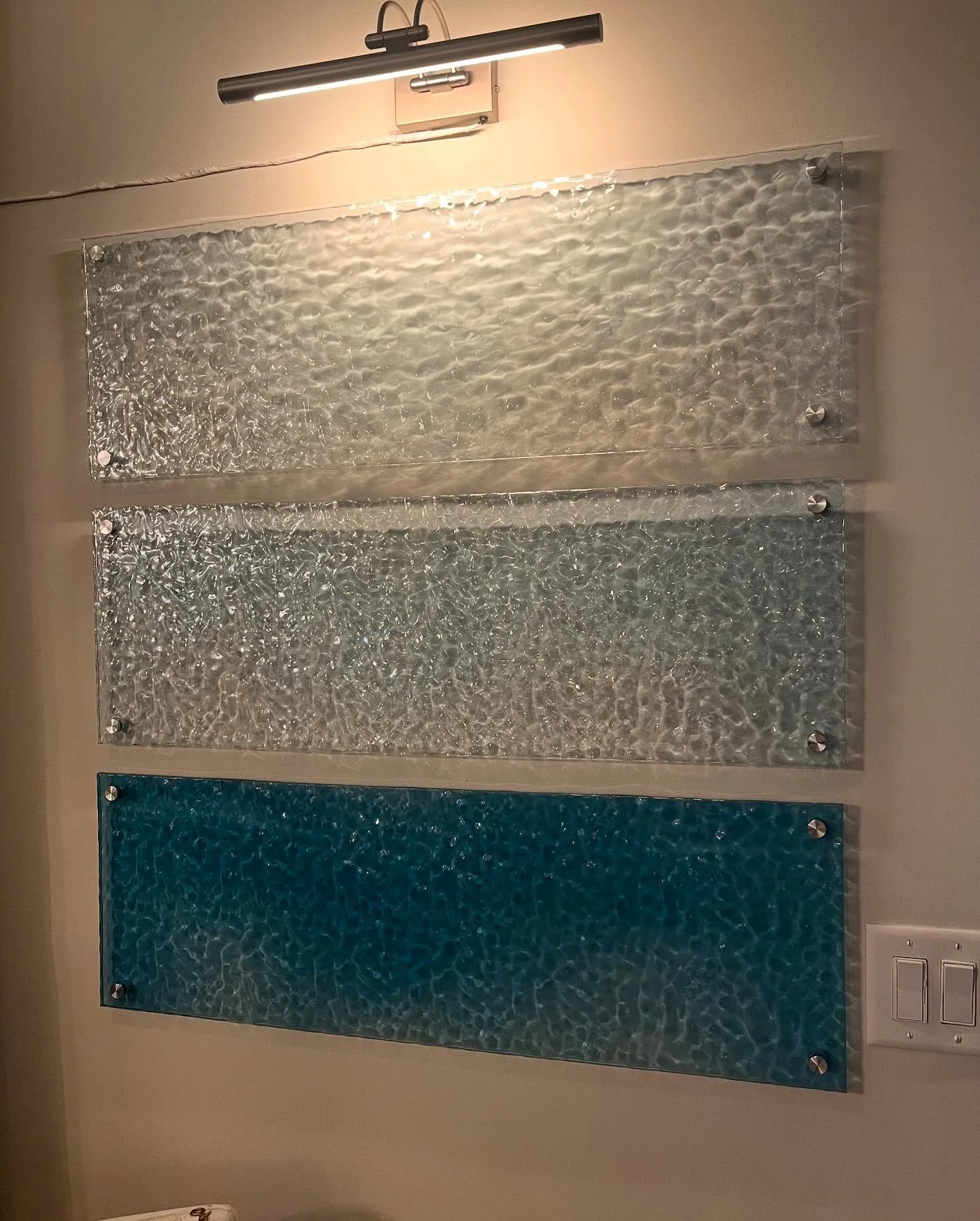 Some brand new work just in time for Summer - this piece tends to change in different light, much like the ocean! Do you like these water panels better with the gallery lights on or off?