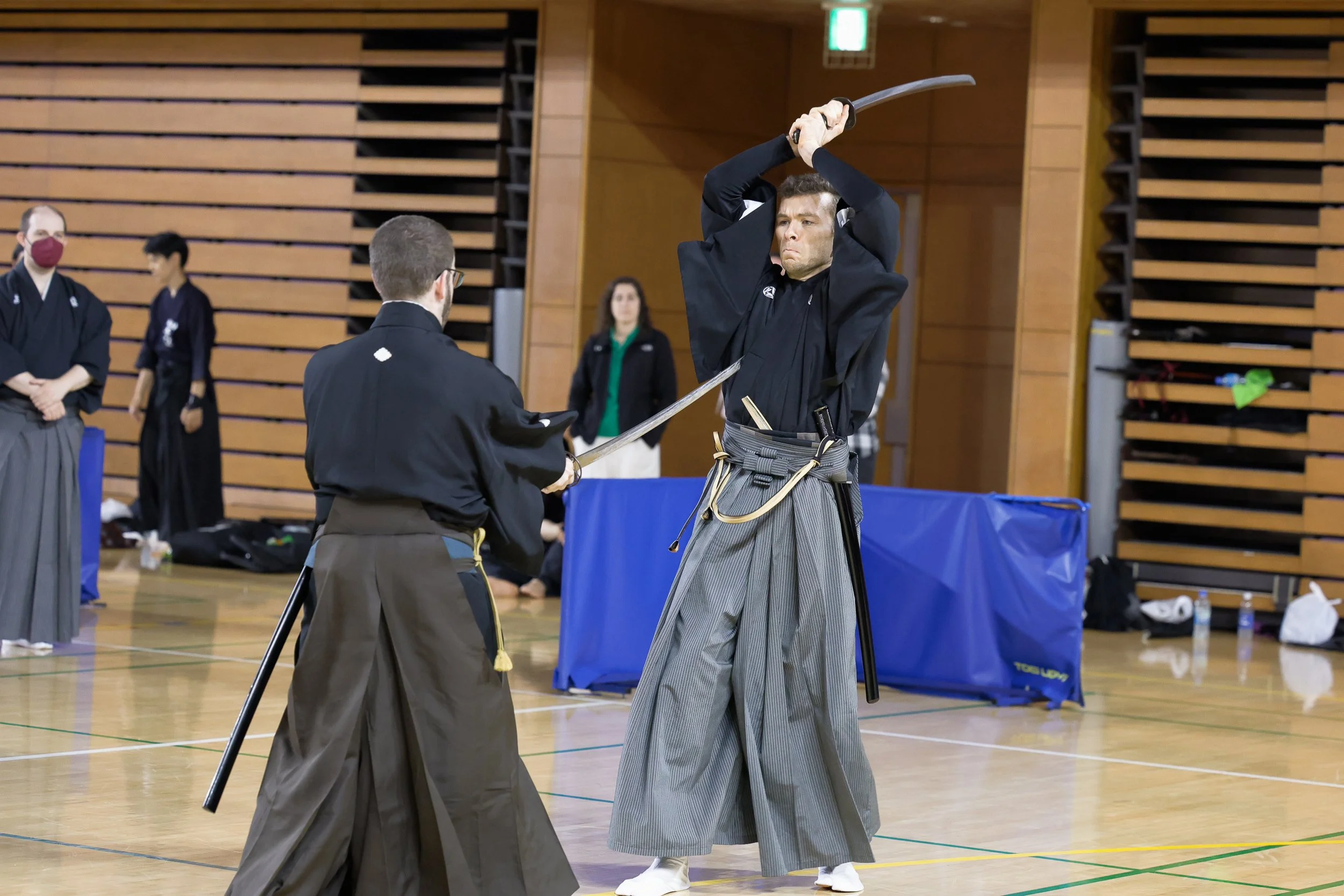 Michael Shane and Zach Biesanz demonstrate kumitachi in Japan