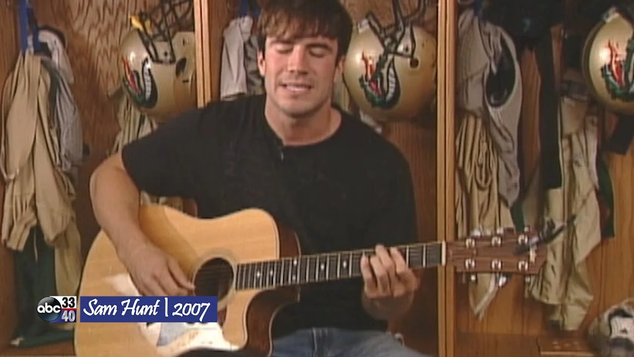 sam hunt guitar in locker room.jpg