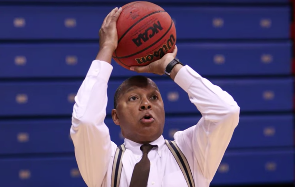 wynton marsalis shoots basketball.png