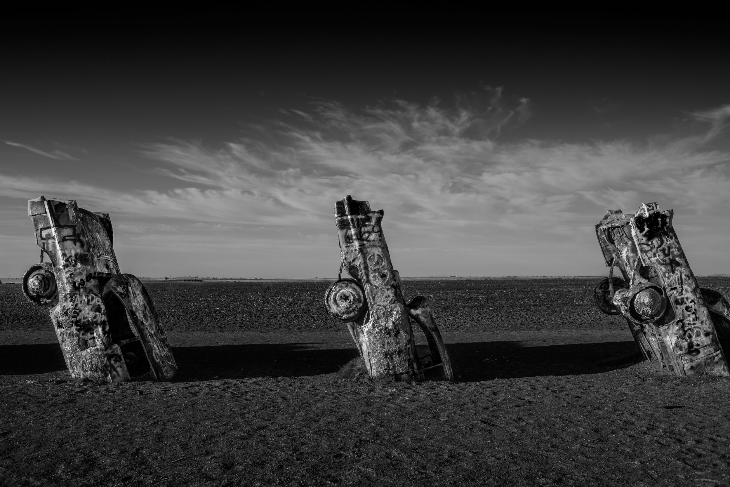 Three Cadillacs