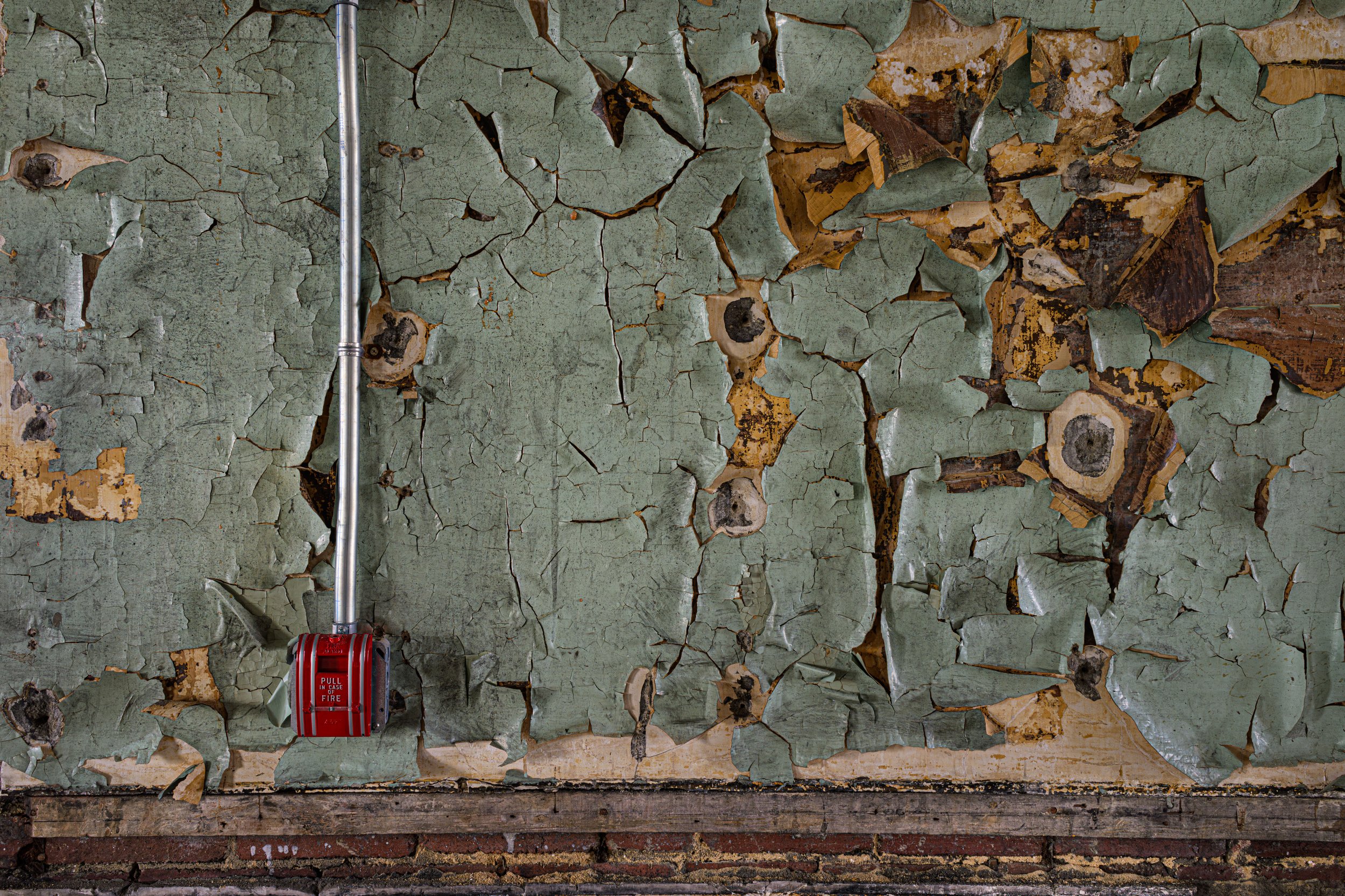 Years of leaded paint have cracked and peeled.