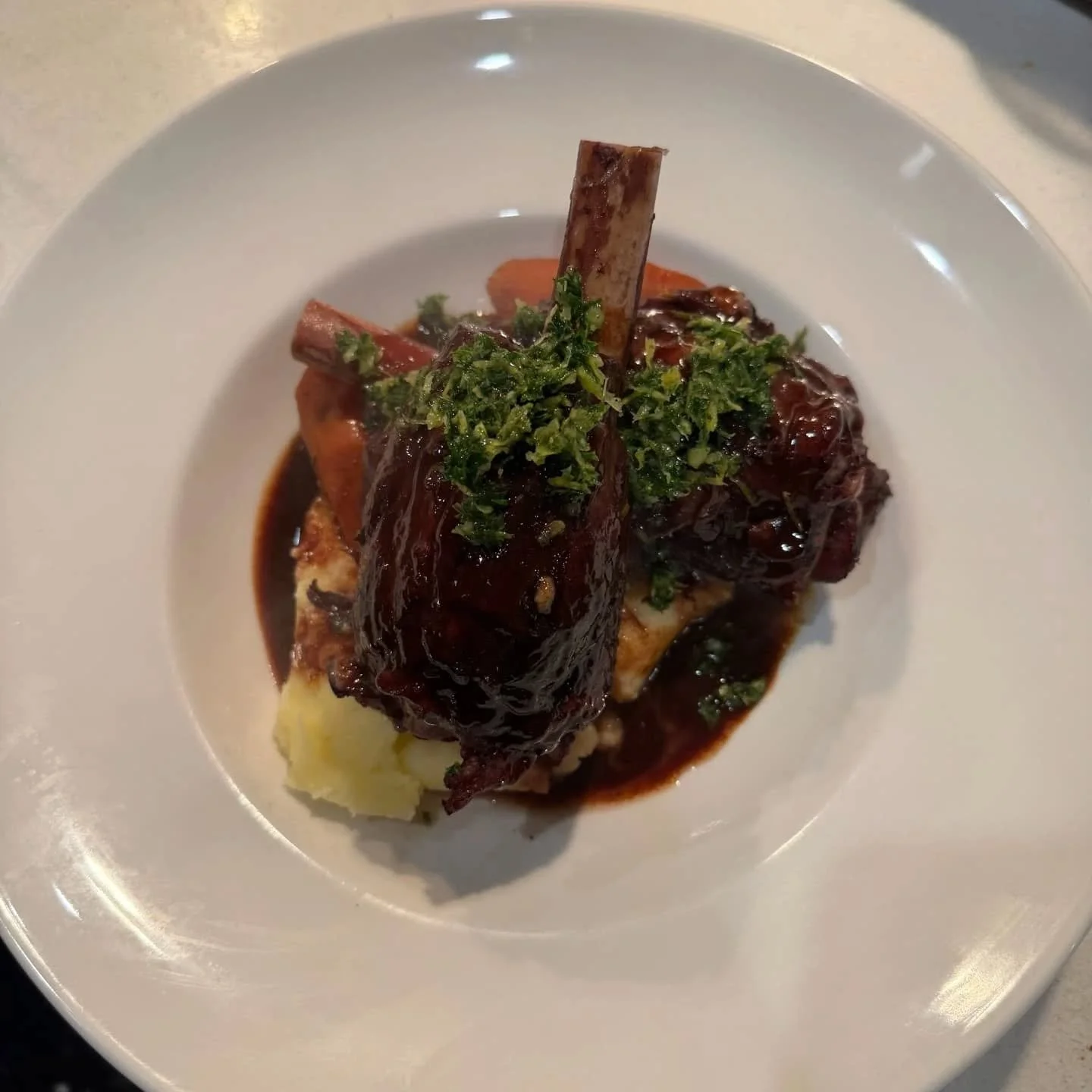 The perfect winter warmer!
Lamb Shanks are up on our specials board for a limited time only.

Two Lamb shanks braised in red wine and rosemary
Served with creamed mashed potato and gremolata. 

Also available takeaway to enjoy at home.

Takeaway deal