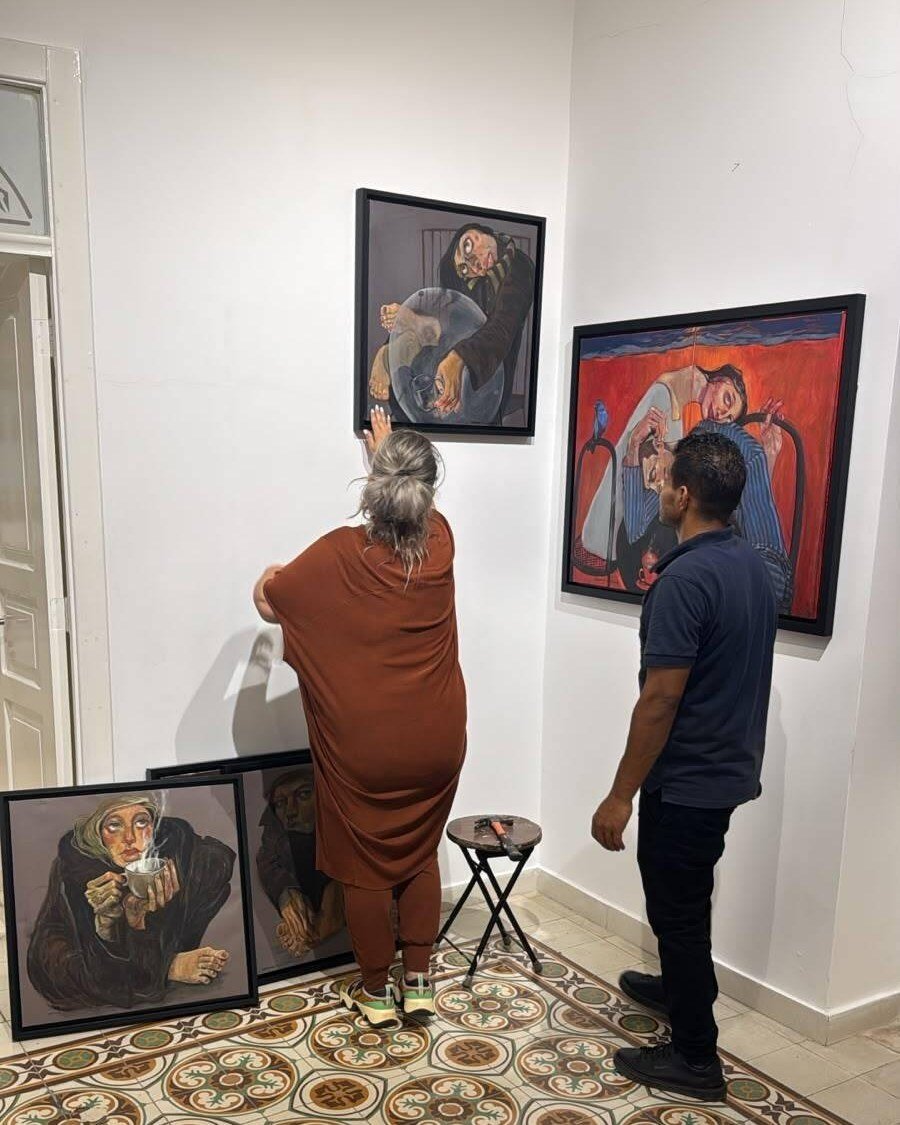 Zeena Sileem (@zeenasileem) paints people the way tables hold them: without flattery, and without looking away.

Hands and feet arrive enlarged past anatomy. Eyes hold you longer than is comfortable. Color is laid down like weather.

She trained in B