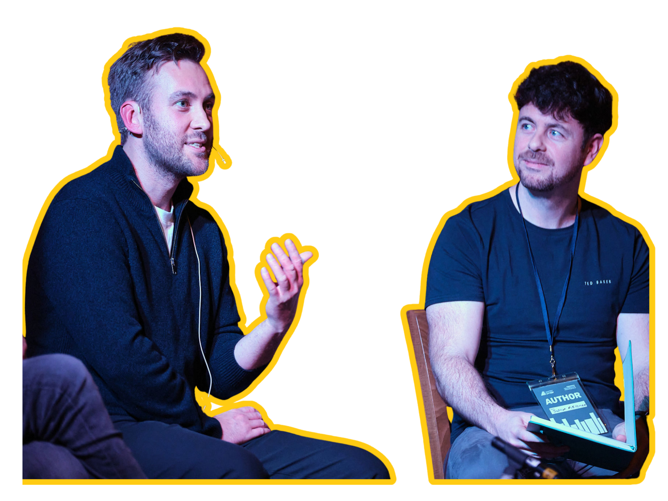 Two men engaged in a conversation during an event. The man on the left is speaking, wearing a dark jacket and headphones, and the man on the right is listening, wearing a navy shirt with an author badge and holding a tablet with charts.