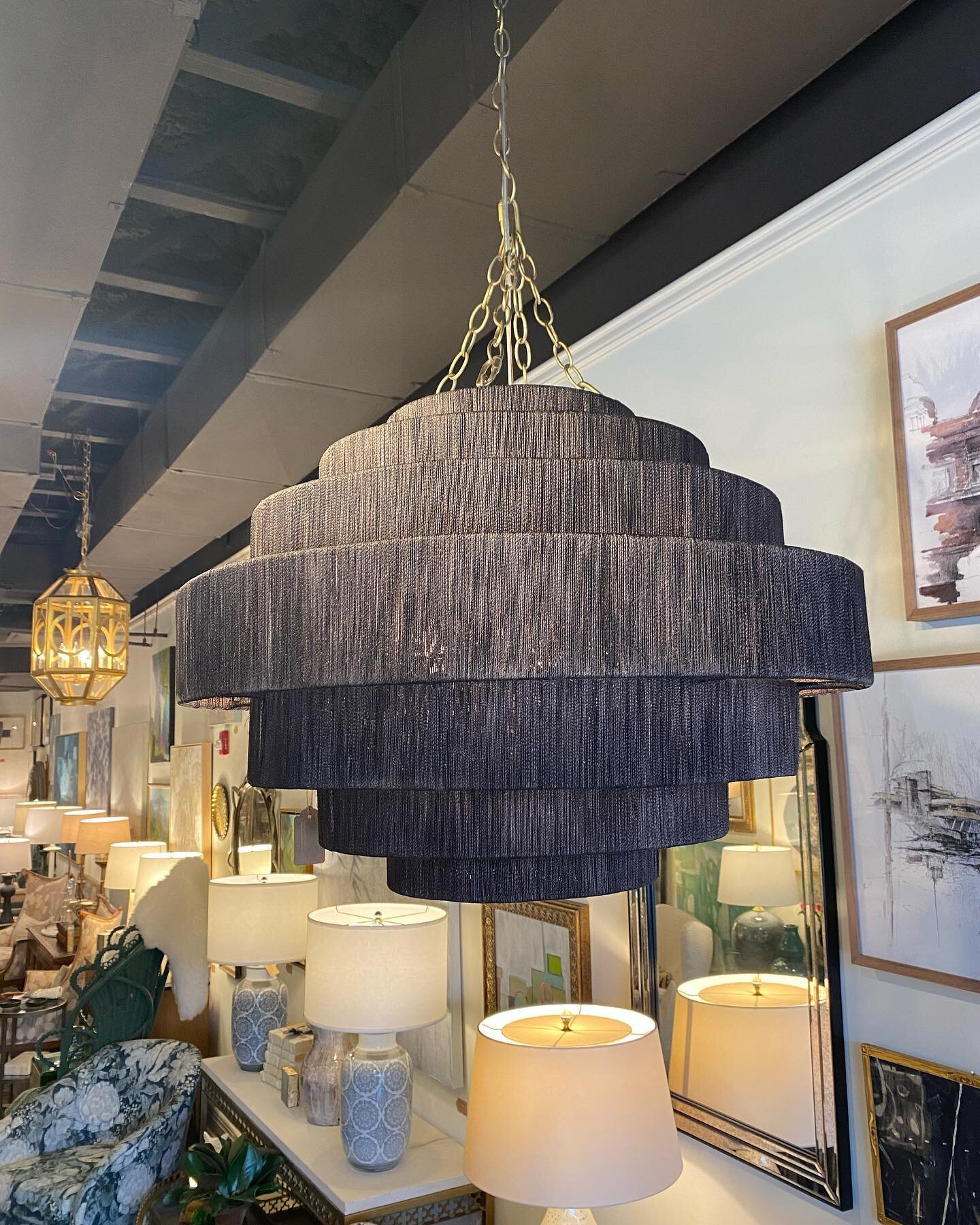 See our collection of unique lighting @marketplaceinteriorsnashville 
1st - espresso abaca rope with antiqued brass chain &amp; canopy 
2nd - taupe leather strapping chandelier
3rd - horn and metal chandelier
4th - wooden beaded chandelier