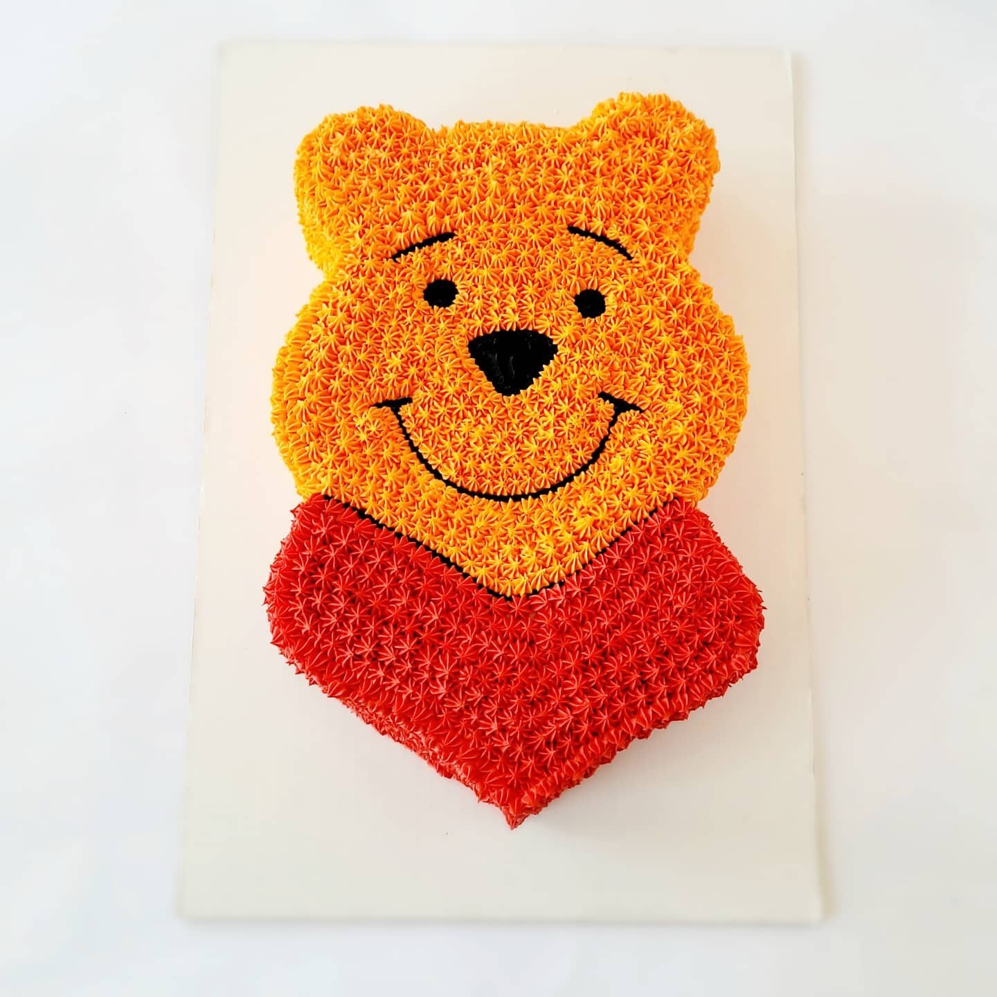 Isn't this the cutest Winnie the Pooh cake!? @pooh  A loving grandmother ordered this for her sweet grandbaby 🥰 
I enjoyed seeing this cake come together.

#winniethepooh #disney #shapedcake 
#purposefulcakes #godisamazing #cakesthatinspire #chocola