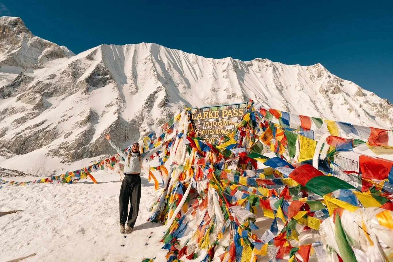Karlie Place at the top of Larkya La Pass, 5,106m, on the Manaslu Circuit Trek