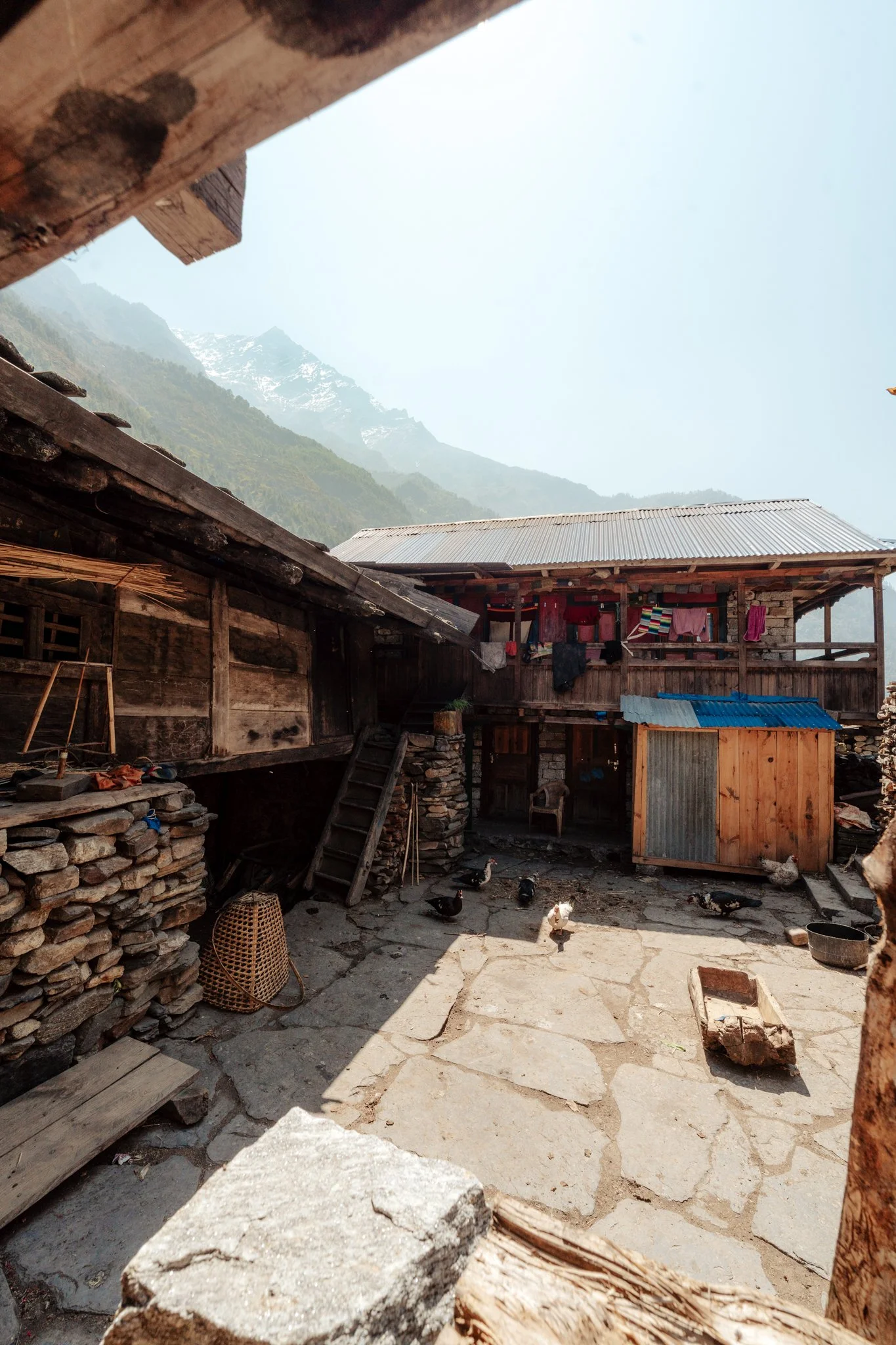 Bihi. People live up here. Real lives, real laundry, real chickens.