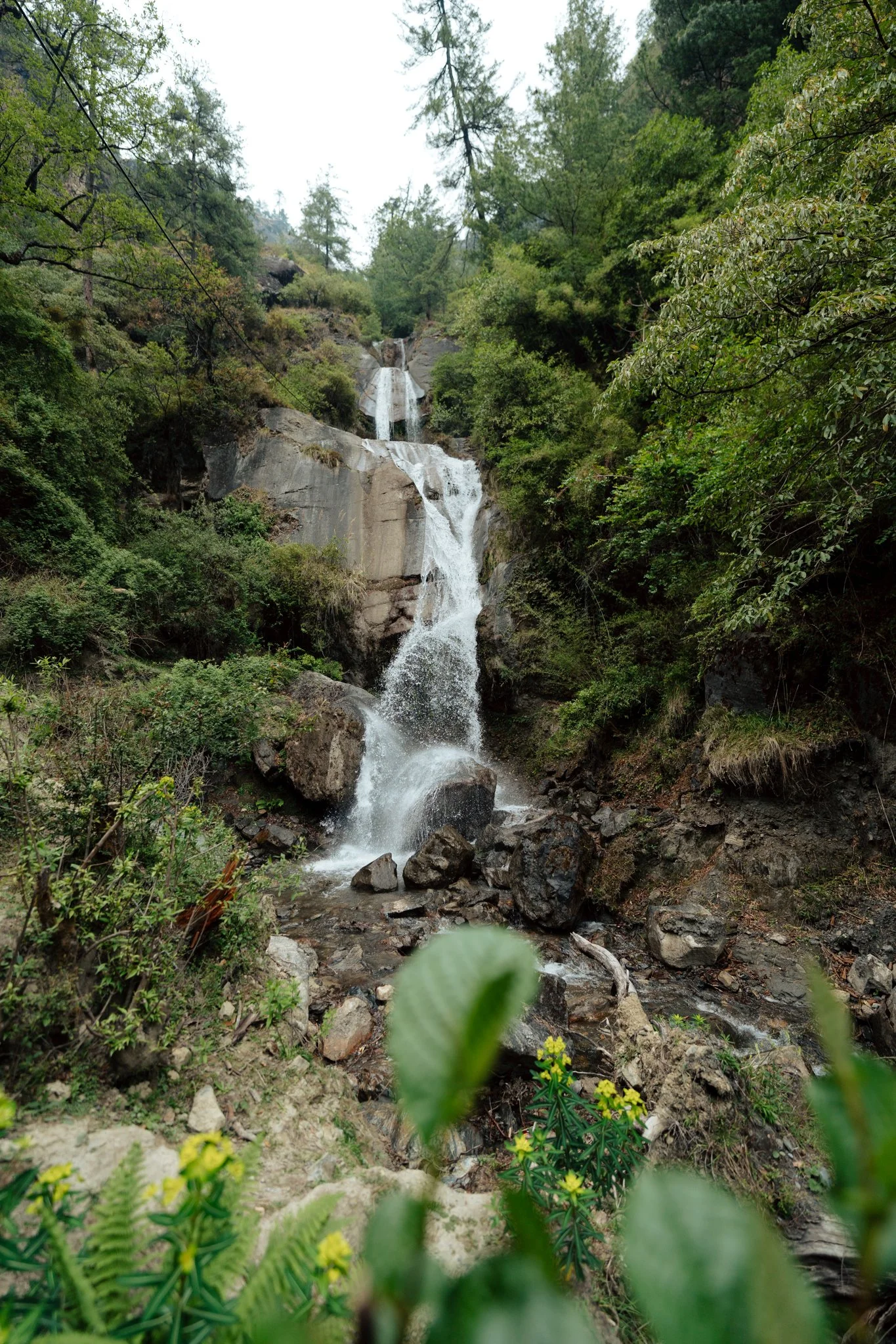 Between Bihi and Ghap, the trail softens into forest and waterfalls.