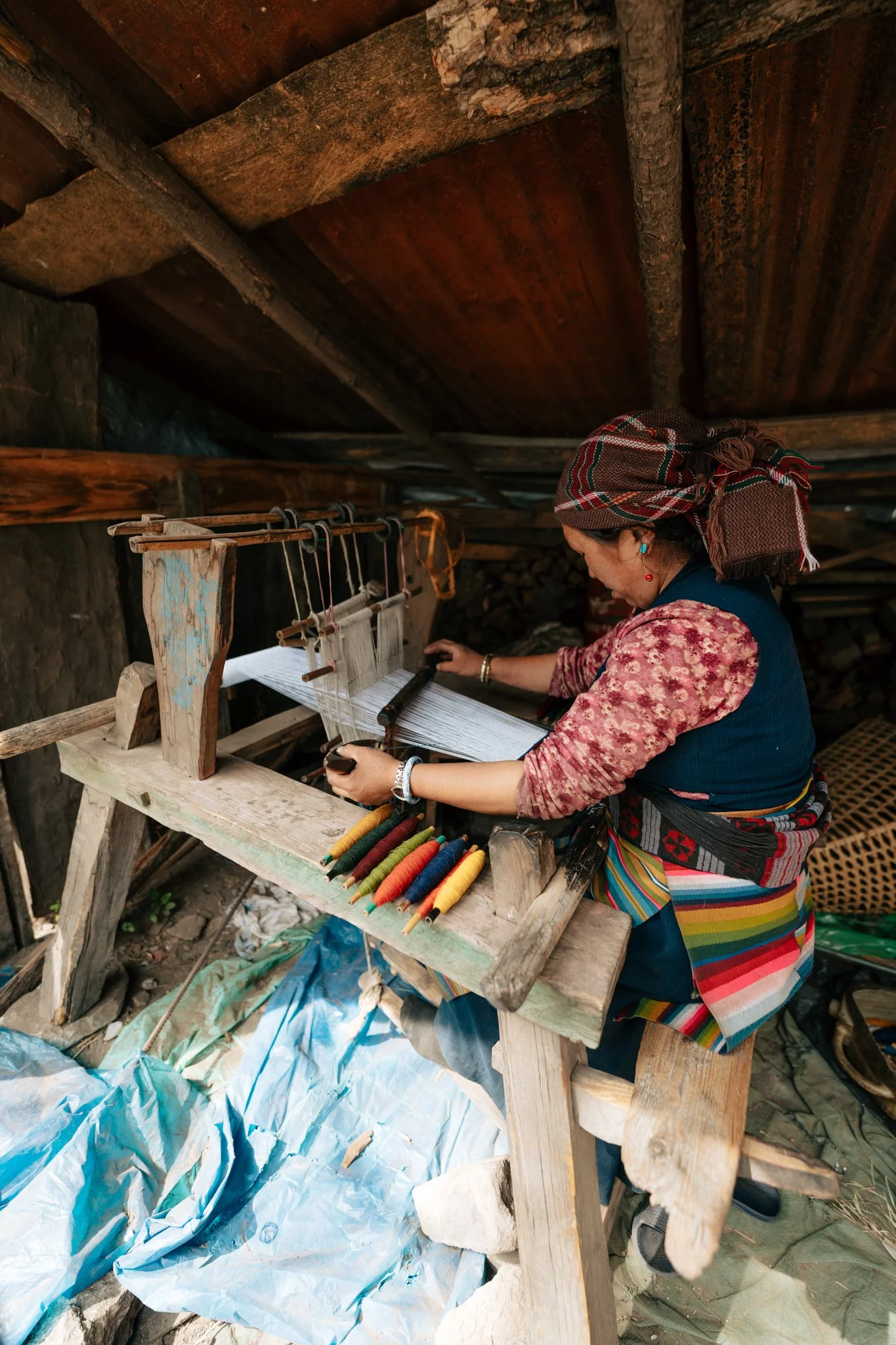 Hand-loom weaving in Namrung. This is daily life here.