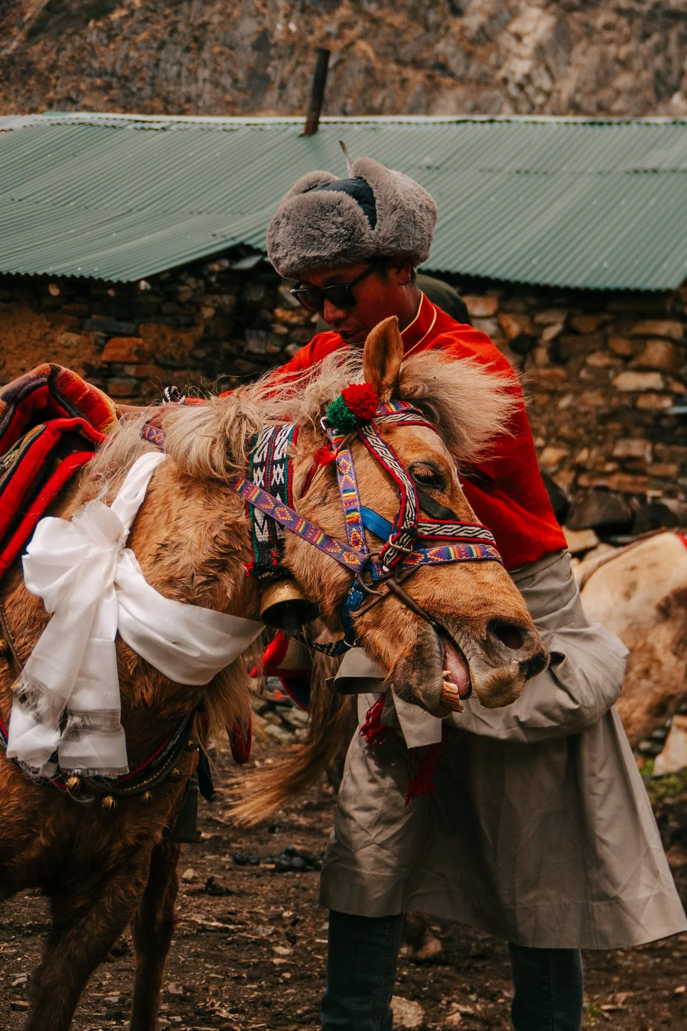 One of the racers with his horse before the start.