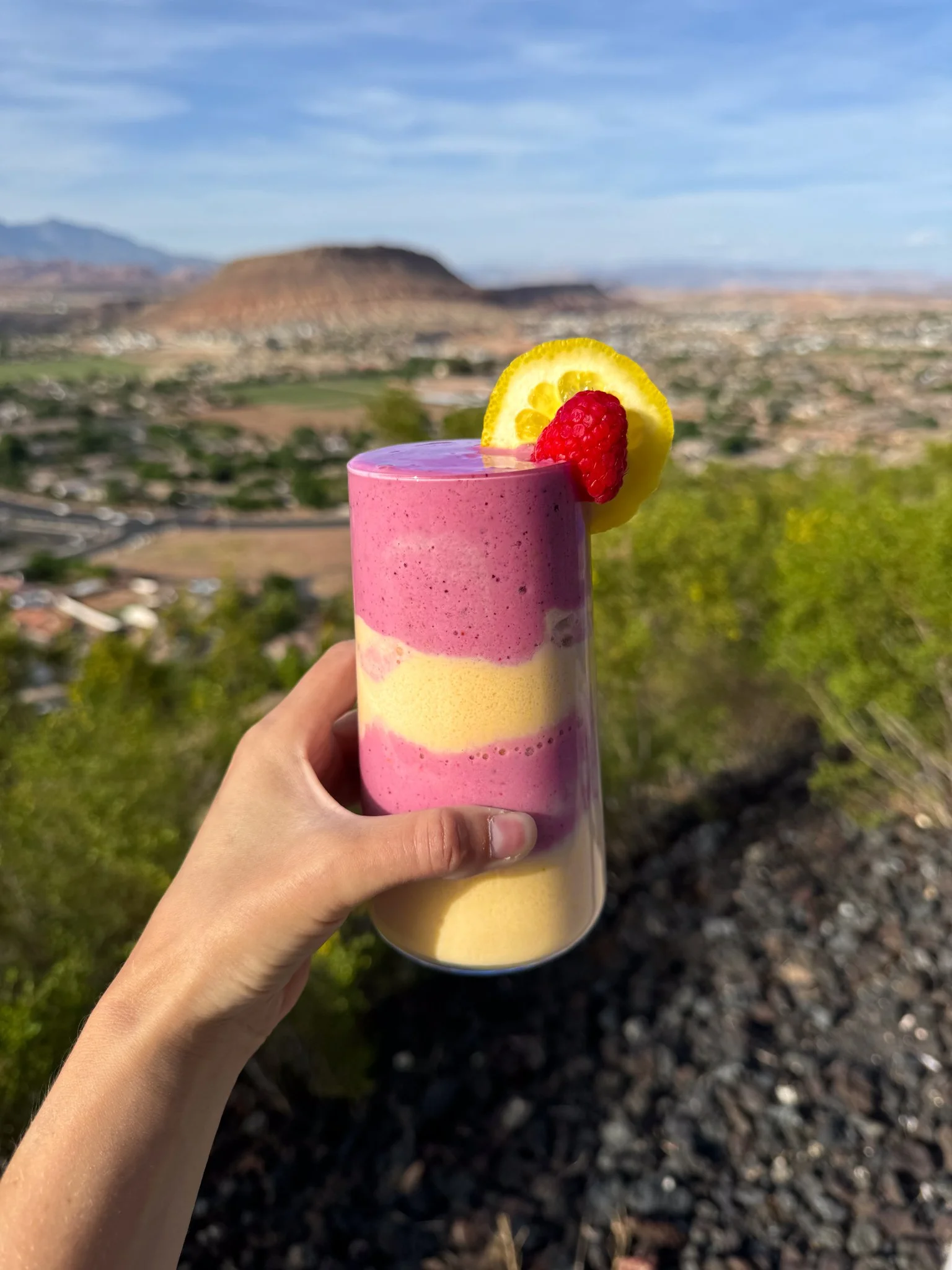 Lemon raspberry layered Ka'Chava protein shake with pink gradient