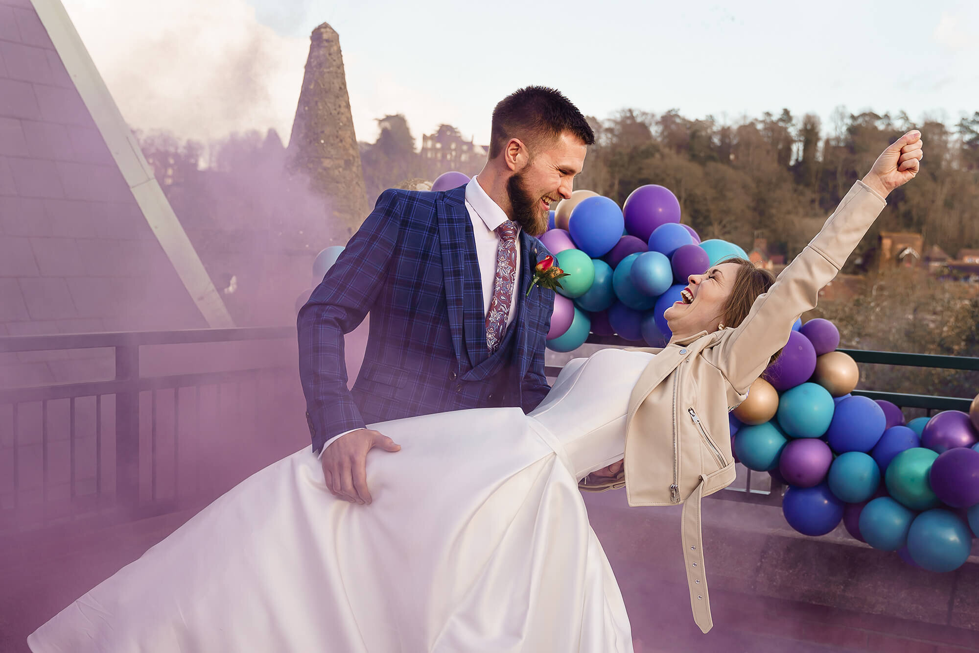 Wedding with smoke bomb bright colours dancing in wedding dress bride celebrating