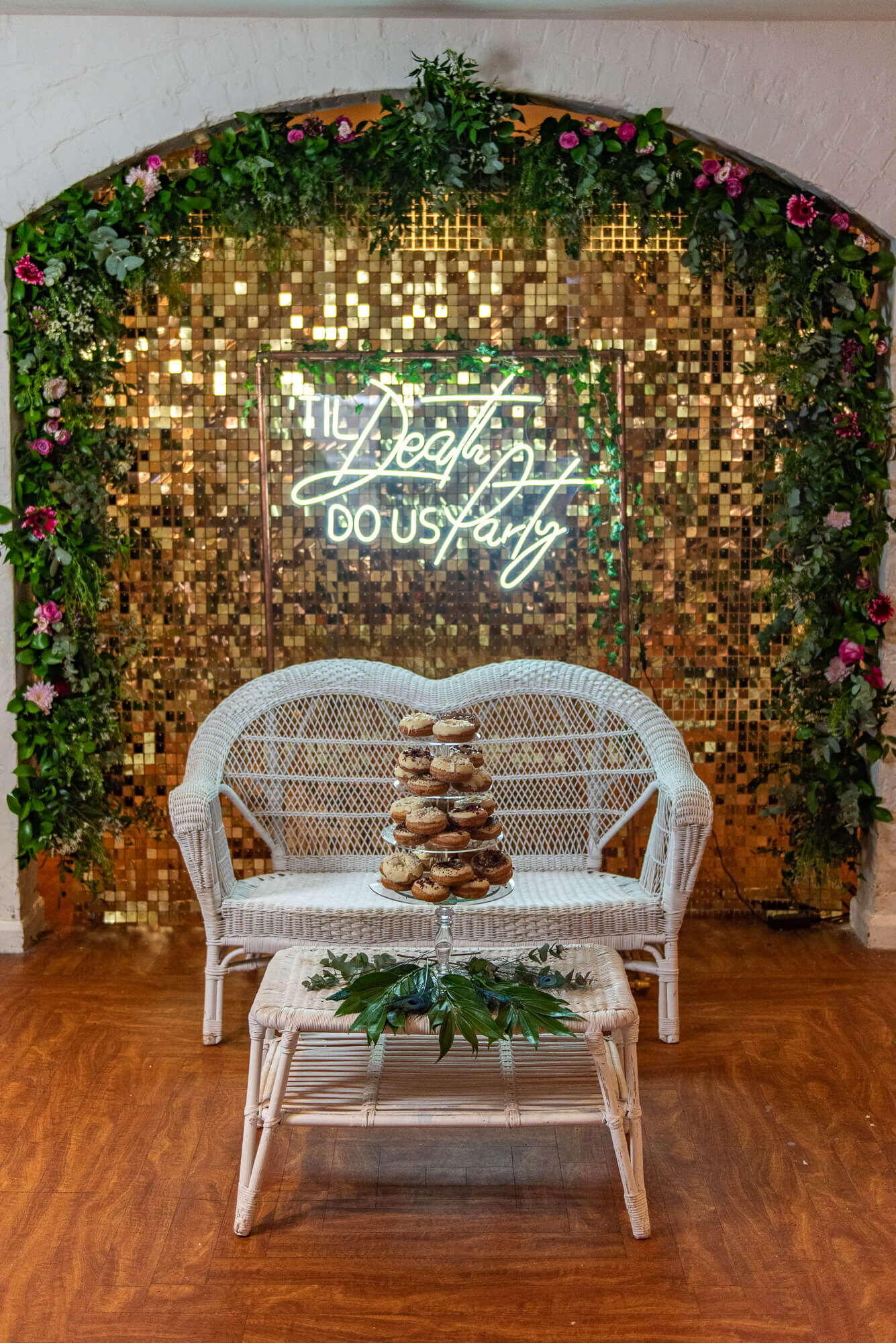 Til death do us party neon wedding sign with donut tower cake