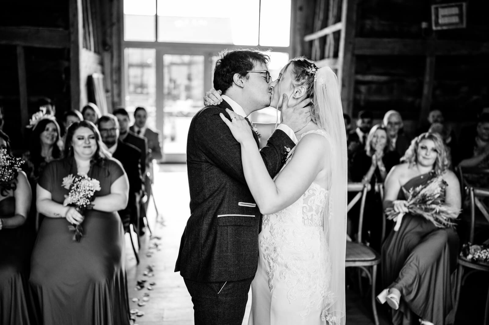 first kiss at silchester farm wedding ceremony
