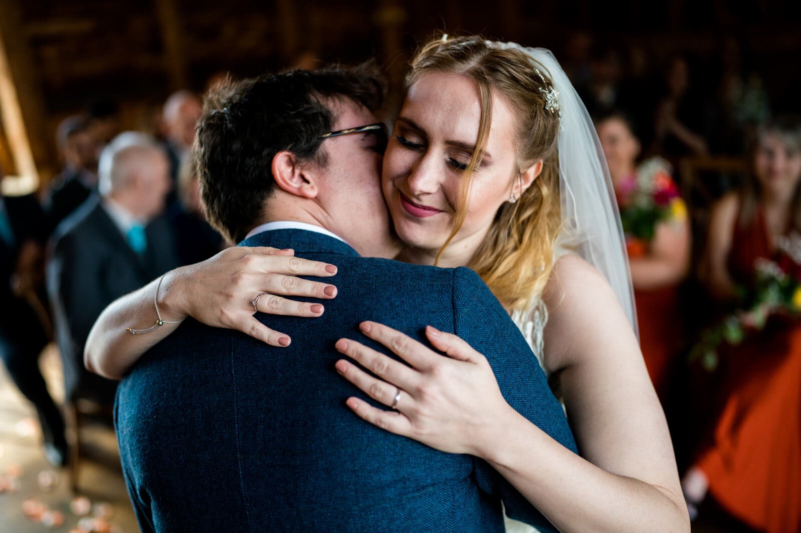 best wedding photos at silchester farm as bride hugs groom