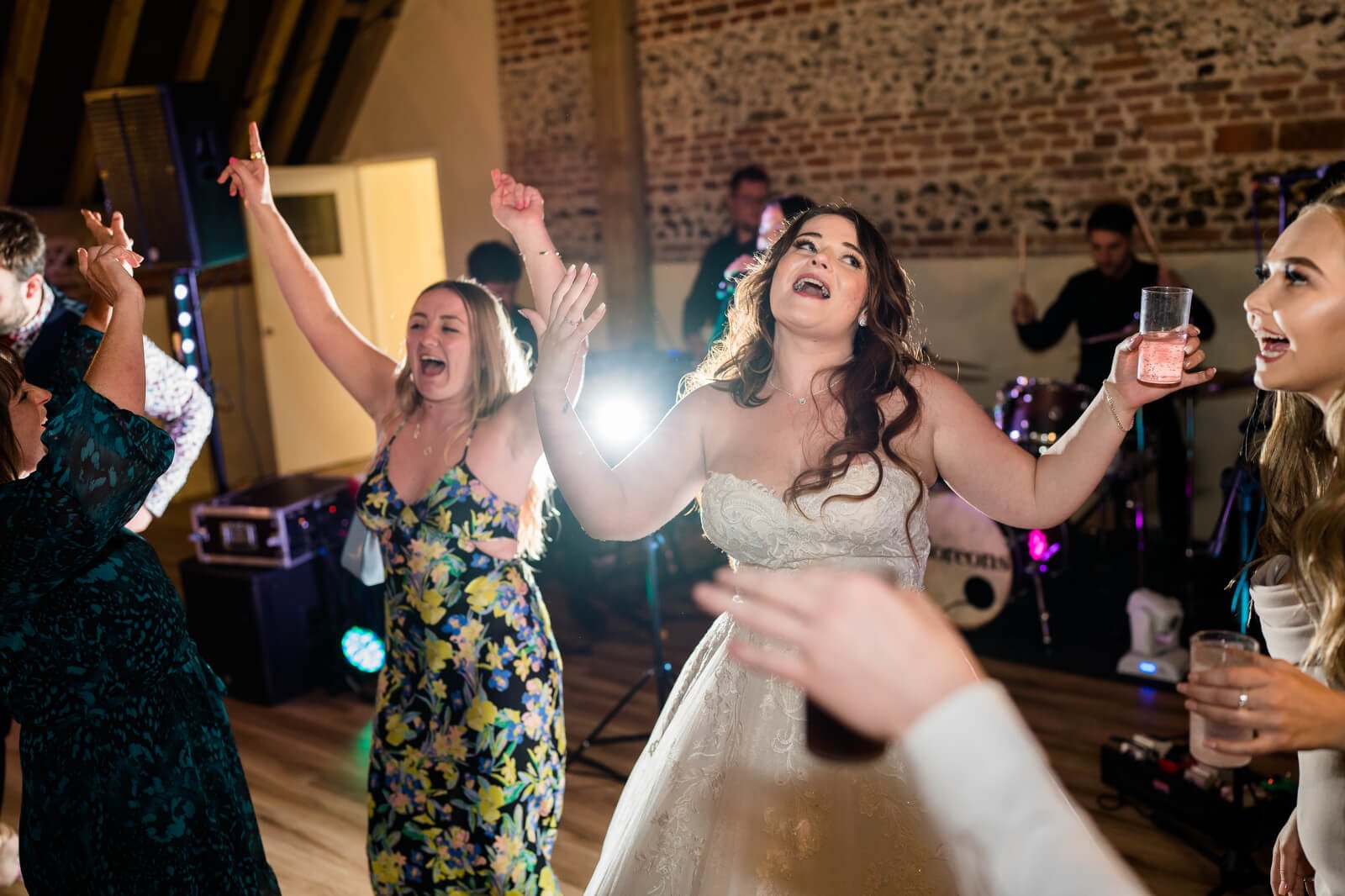 bride dancing at barford park wedding venue with band the deloreons