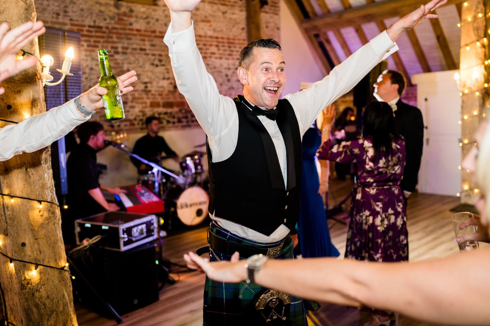 guests dancing at barford park wedding venue with band the deloreons