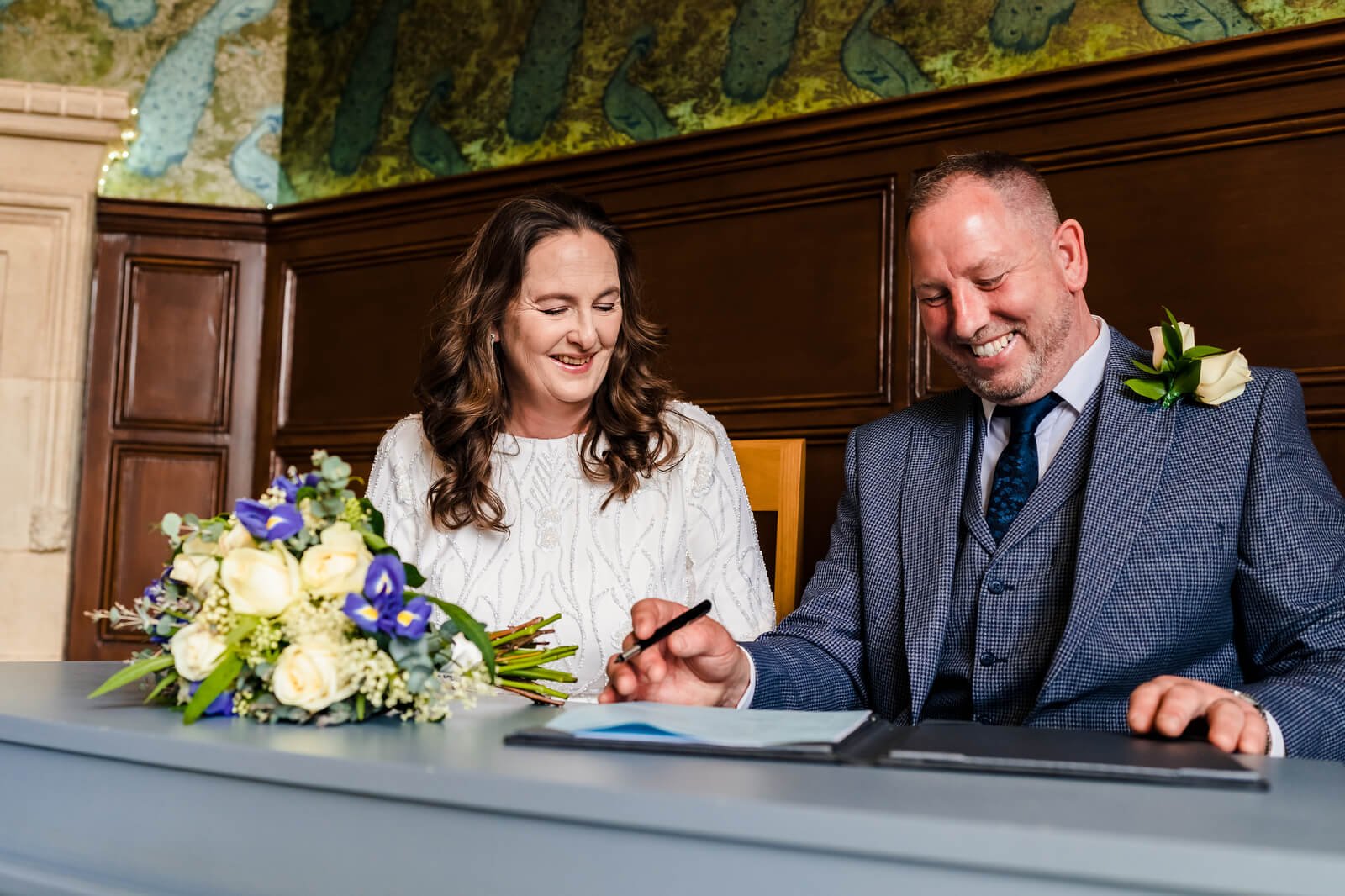 signing the register in basing room at winchester registry office