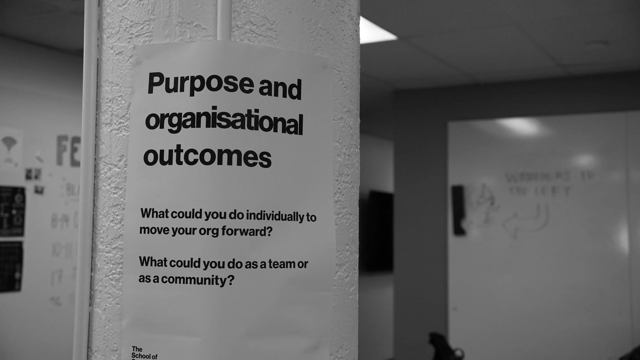 Sign says Purpose and organisational outcomes