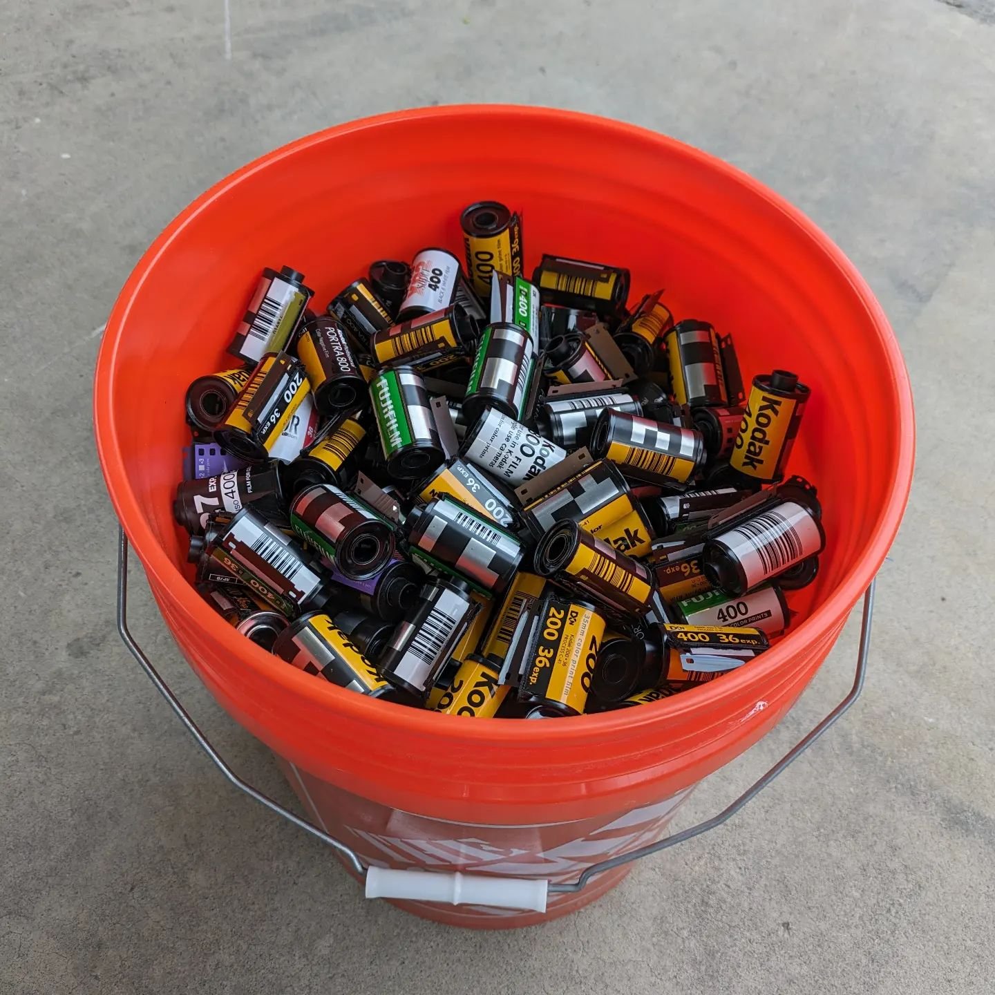 5 Gal bucket of empty canisters. This should do nicely for bulk loading. Thanks @essentialphotosupply and @acmecameraco for the supplies and film! #shootmorefilm #slcdarkroom