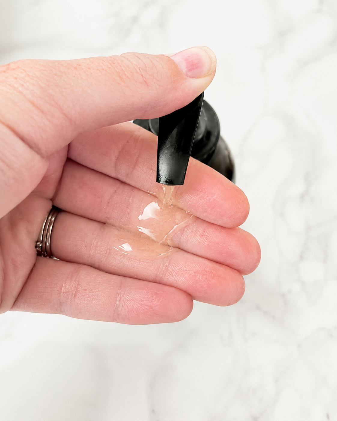 Body serum in hand.PNG