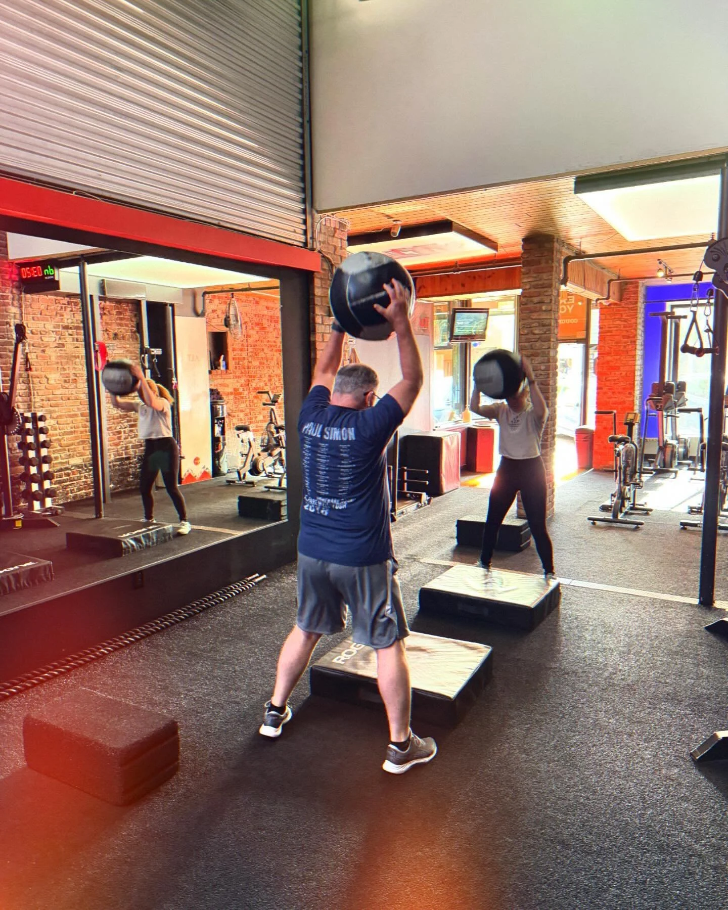 Maddy and Charles crushing this week’s AMRAP!! Nothing like a group workout. #amrap #workout #denver #sweat