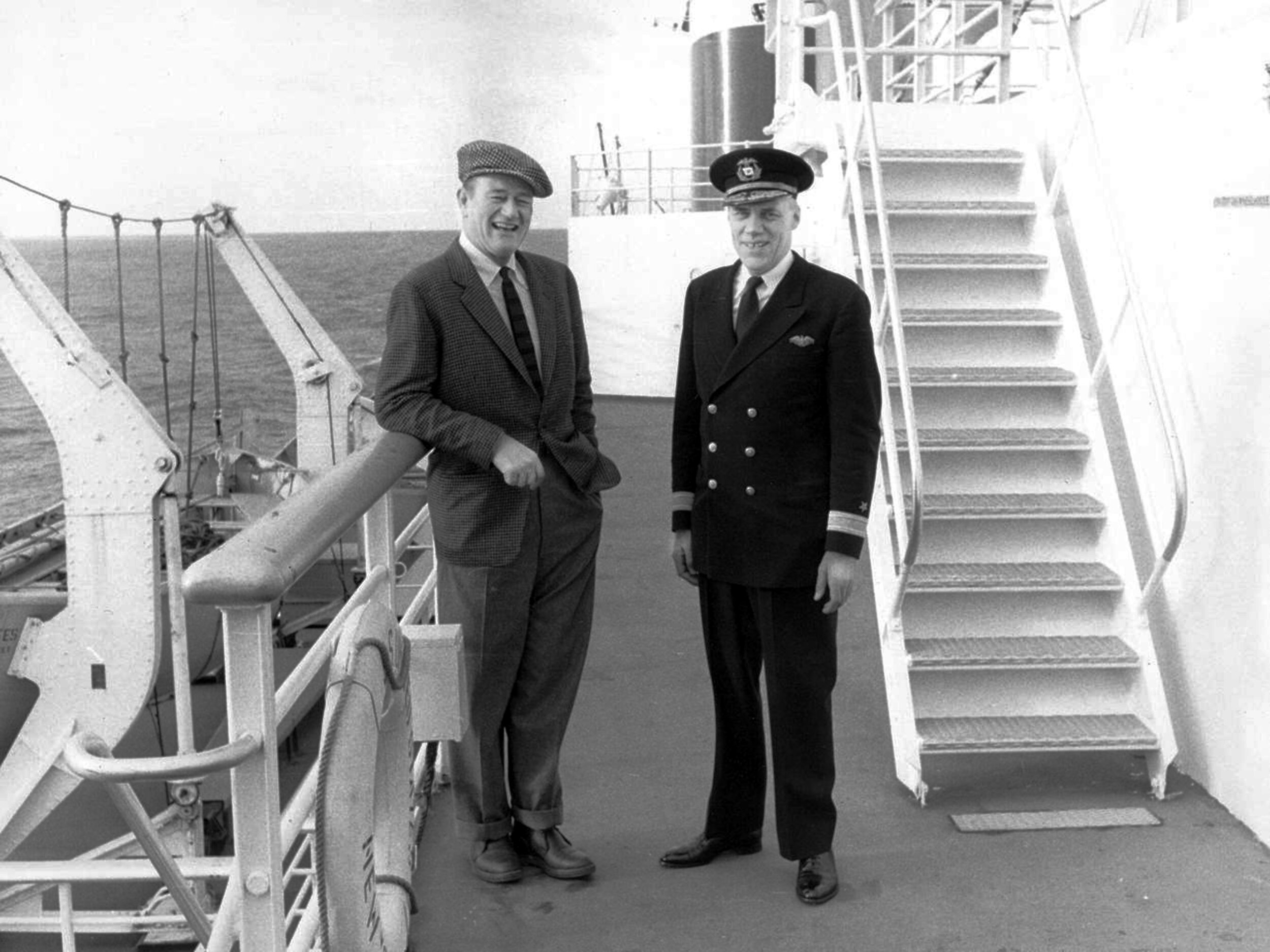 John Wayne with Commodore John Anderson on the Sports Deck