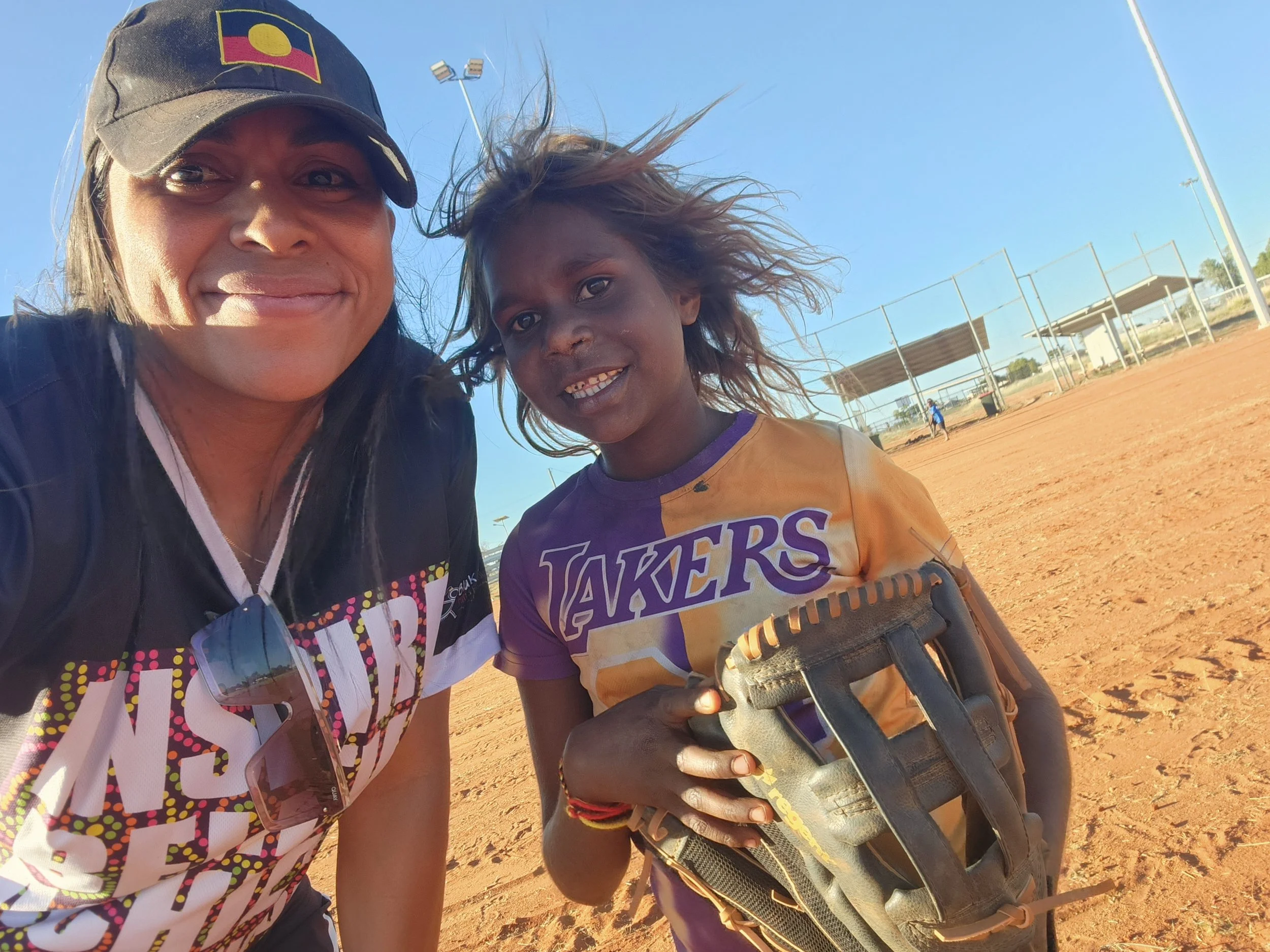  Blakdoll Sports & Fitness Mob Founder Vanessa and Yuendumu Community Softball Participant. 