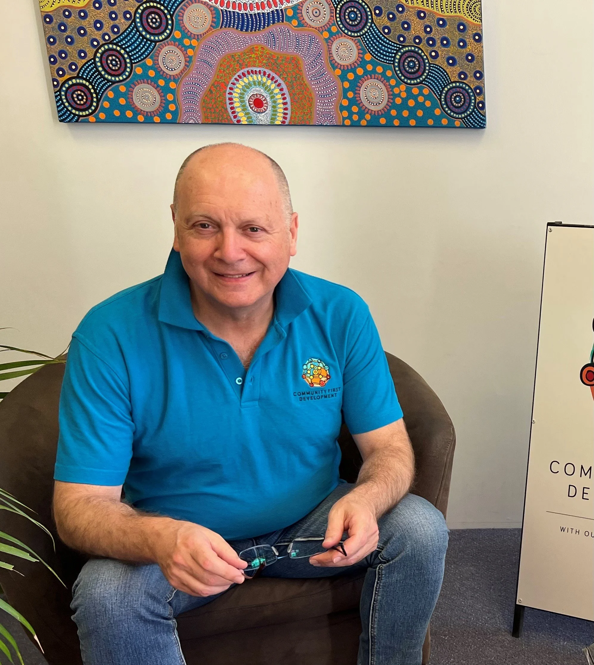 Paul visiting the Community First Development office in Alice Springs.