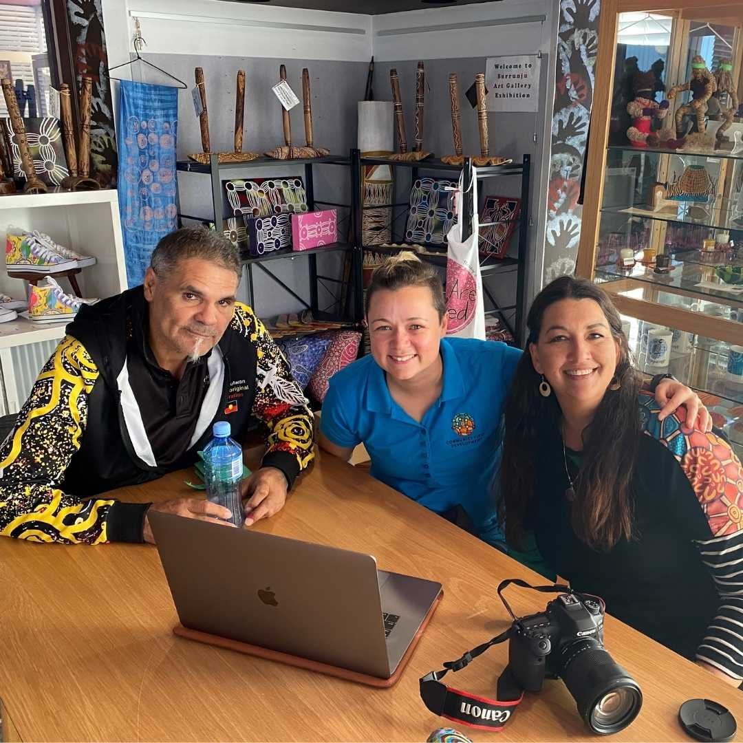 Community member Dale, skilled volunteer Deb, Community Development Officer Ruth, working together to enhance the presence of local Aboriginal artists in Canberra. 