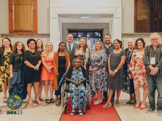  Australian Evaluation Society (AES) Scholarship awardees for emerging First Nations’ evaluators, with some of the First Nations’ members of the AES. Deb pictured fourth on the right, Doyen on the far right. 