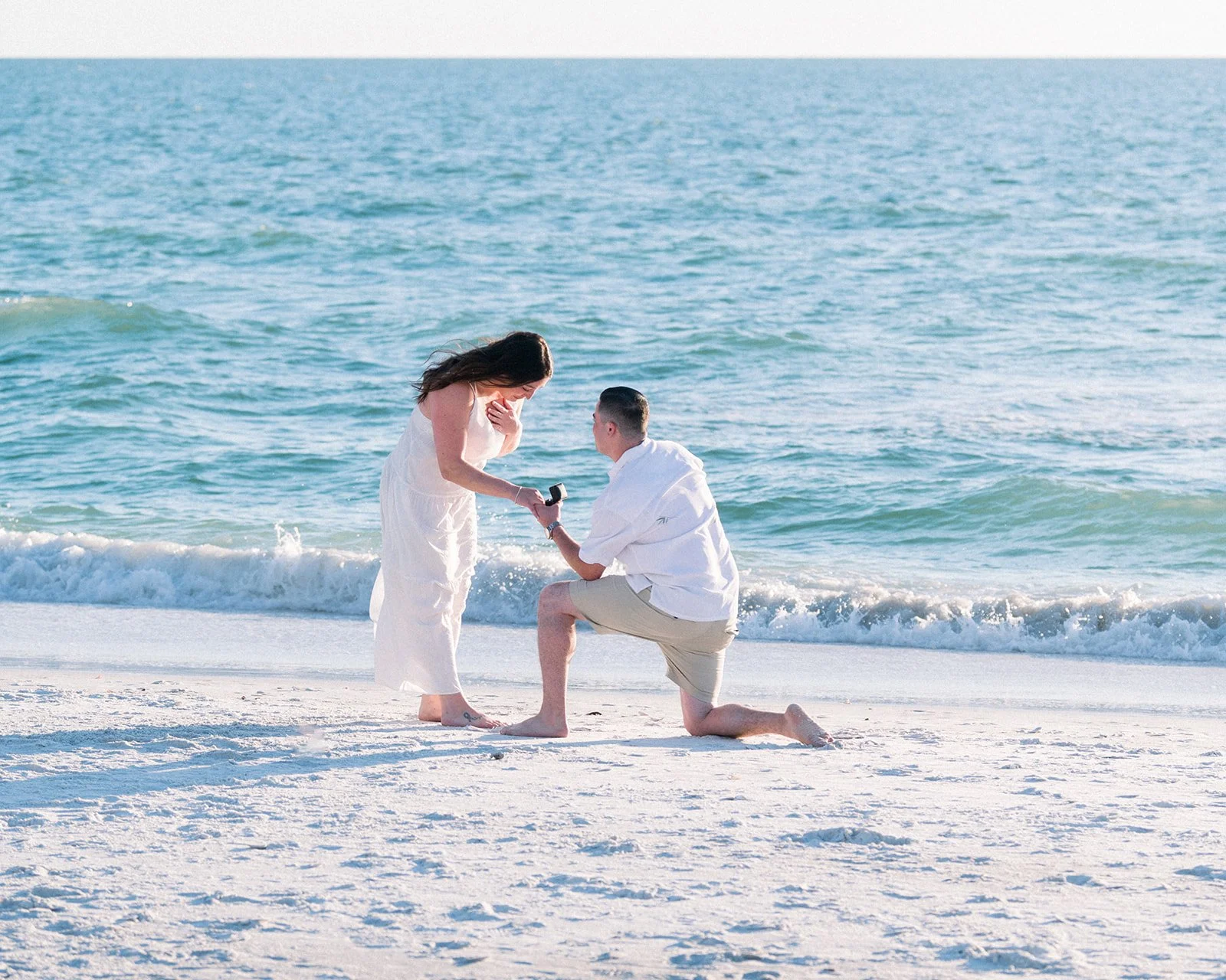 Capturing Love: A Sunny Lido Beach Proposal and Engagement Photos in Sarasota, Florida