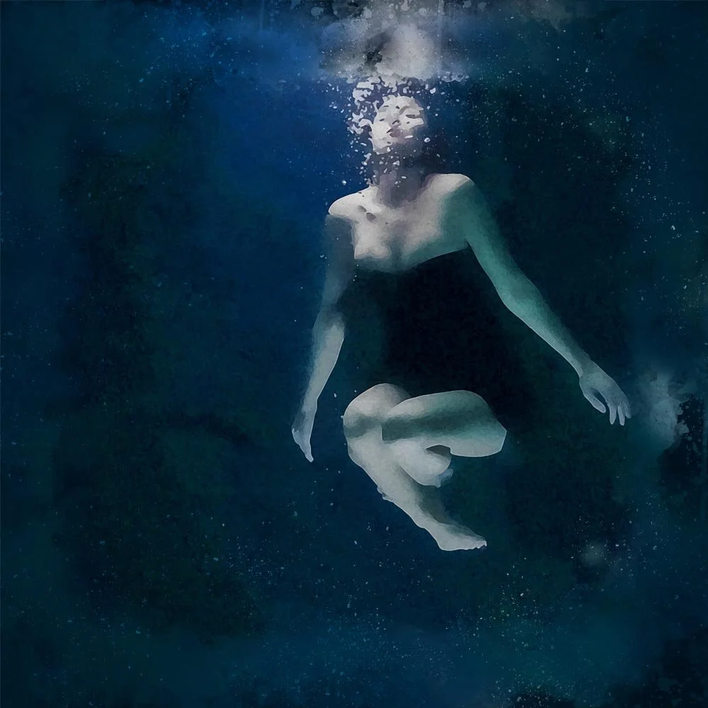 woman wearing a black dress posing underwater abstract figurative print