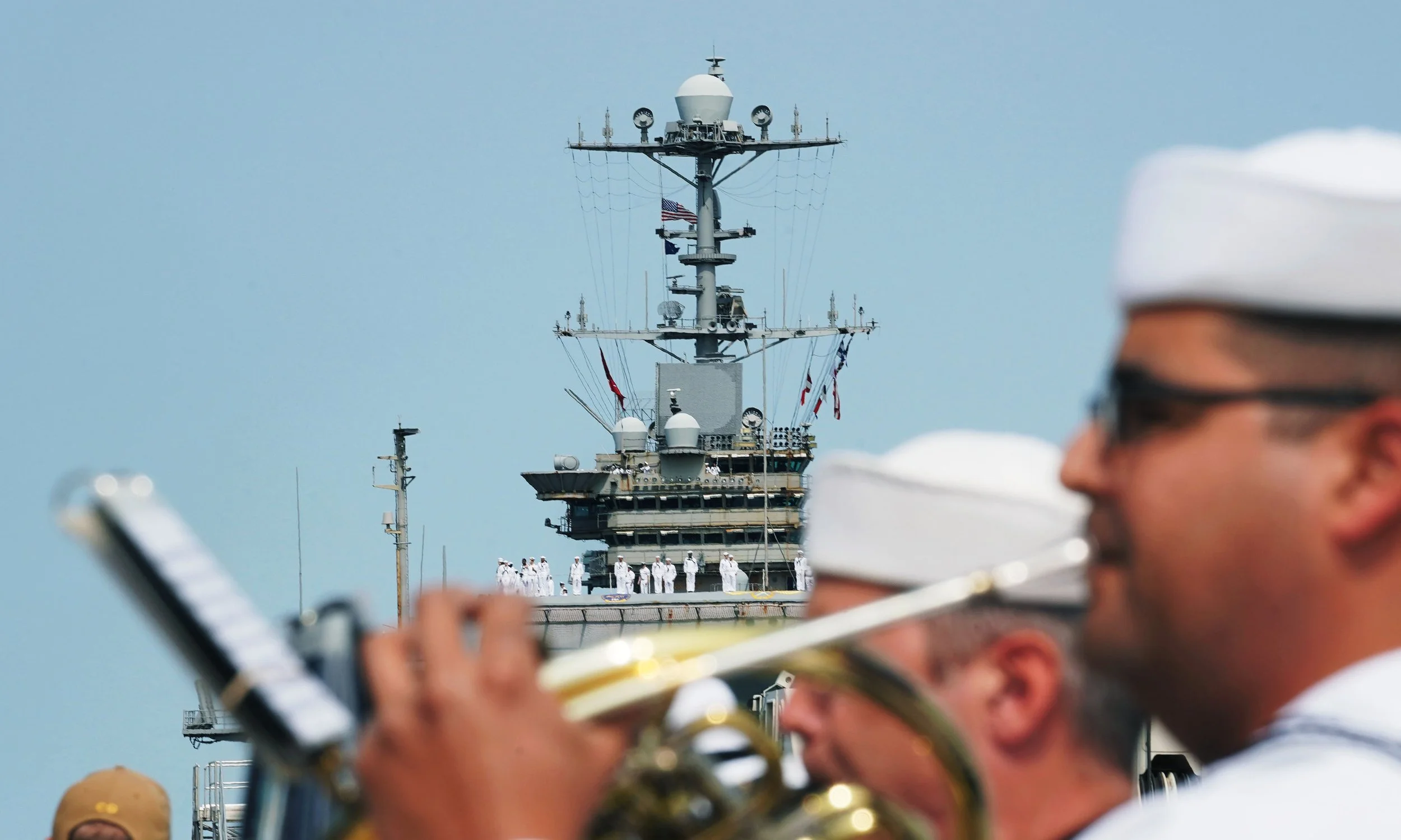  The USS Truman is greeted by a Navy band June 1, 2025 at Naval Station Norfolk after an eight-month deployment.  